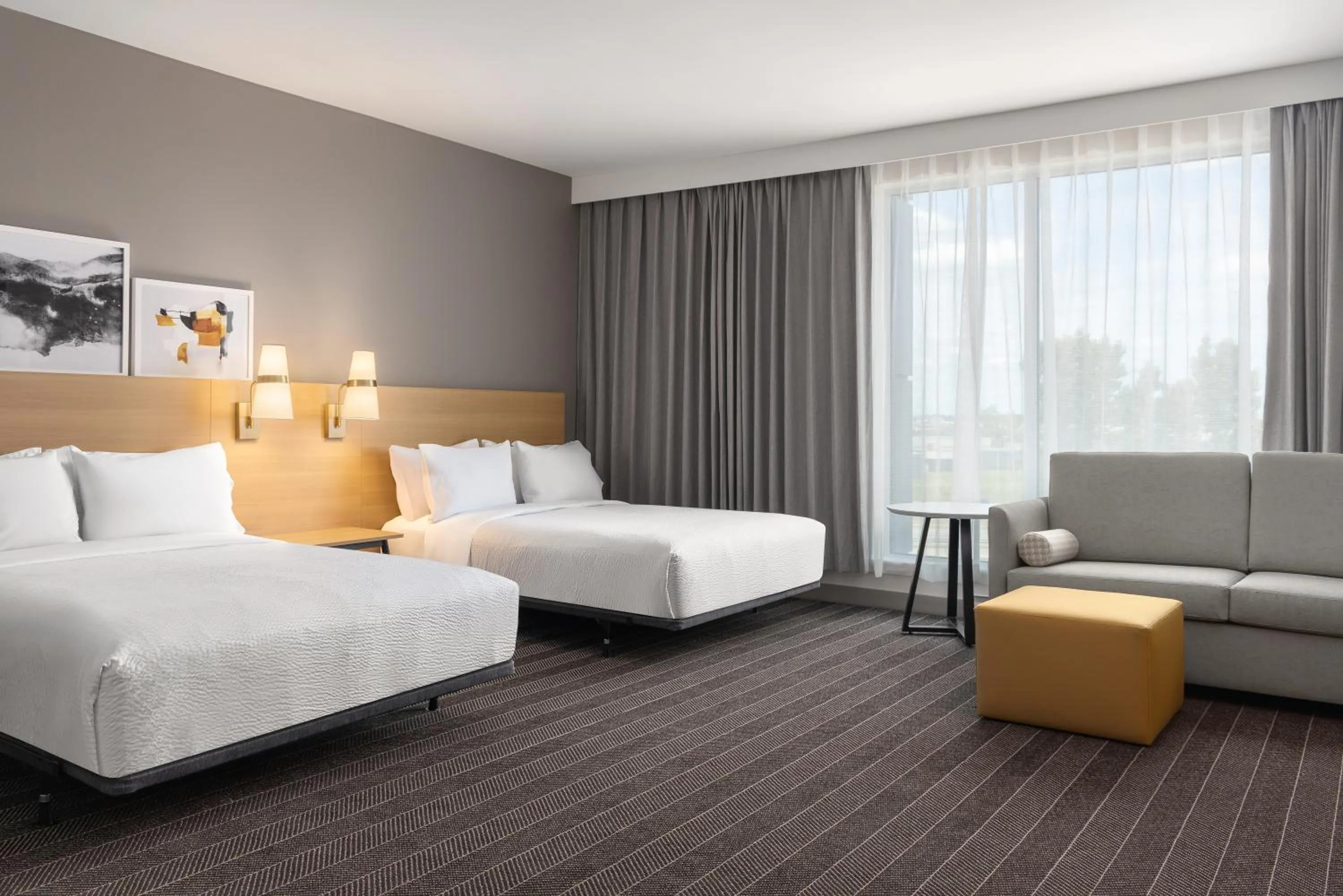 Bed in Staybridge Suites Montreal Airport - St-Laurent by IHG