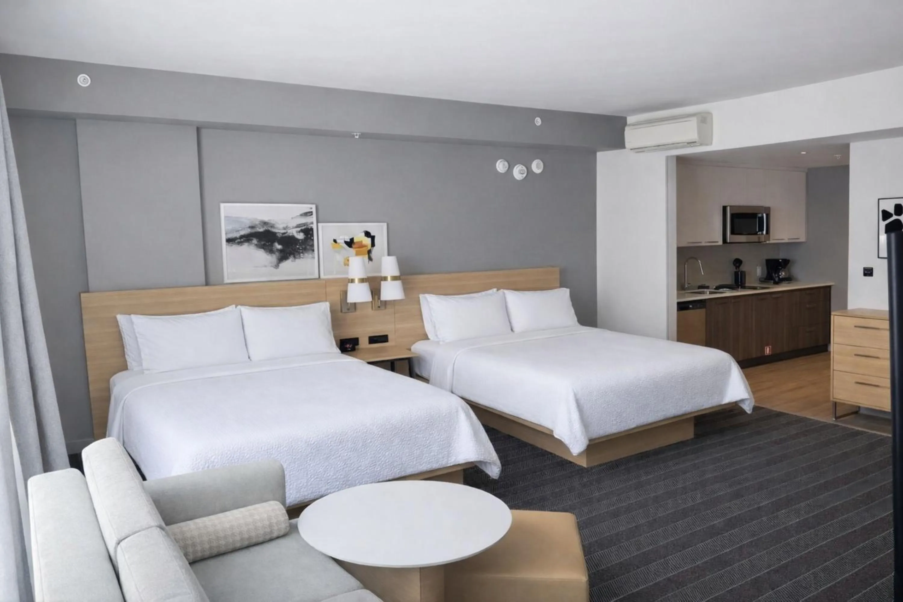 Photo of the whole room, Bed in Staybridge Suites Montreal Airport - St-Laurent by IHG