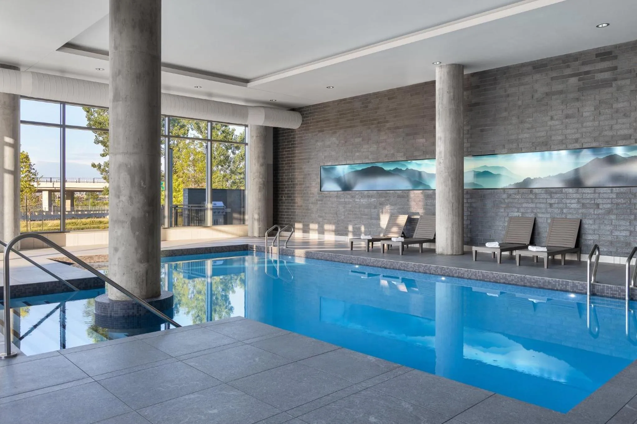 Swimming pool in Staybridge Suites Montreal Airport - St-Laurent by IHG