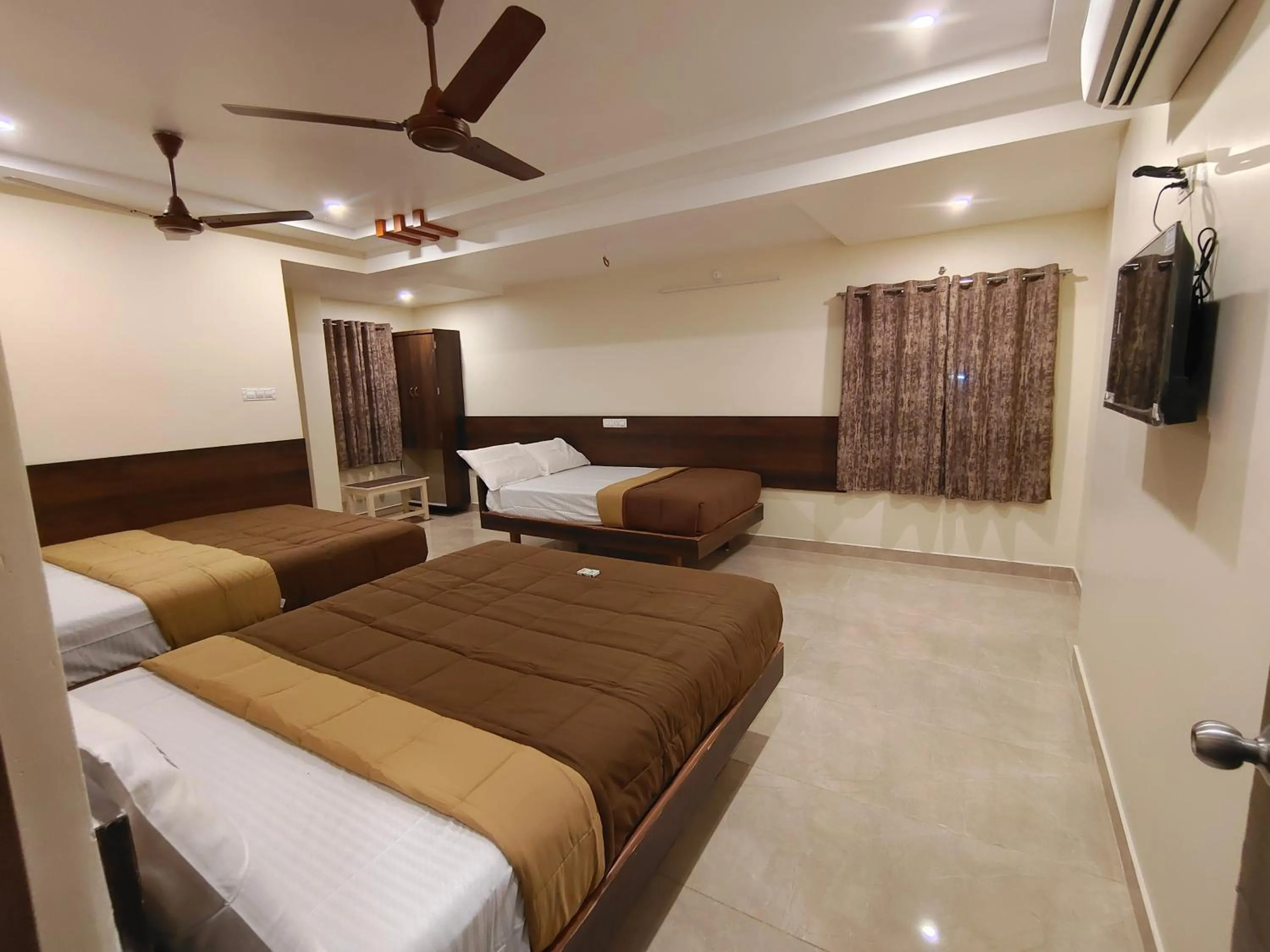 Bed in Hotel DKR Grand