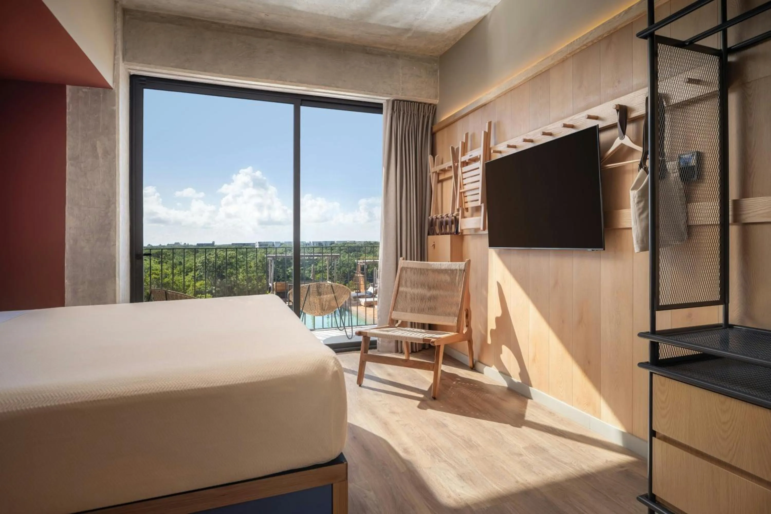 Photo of the whole room, Bed in Moxy Tulum