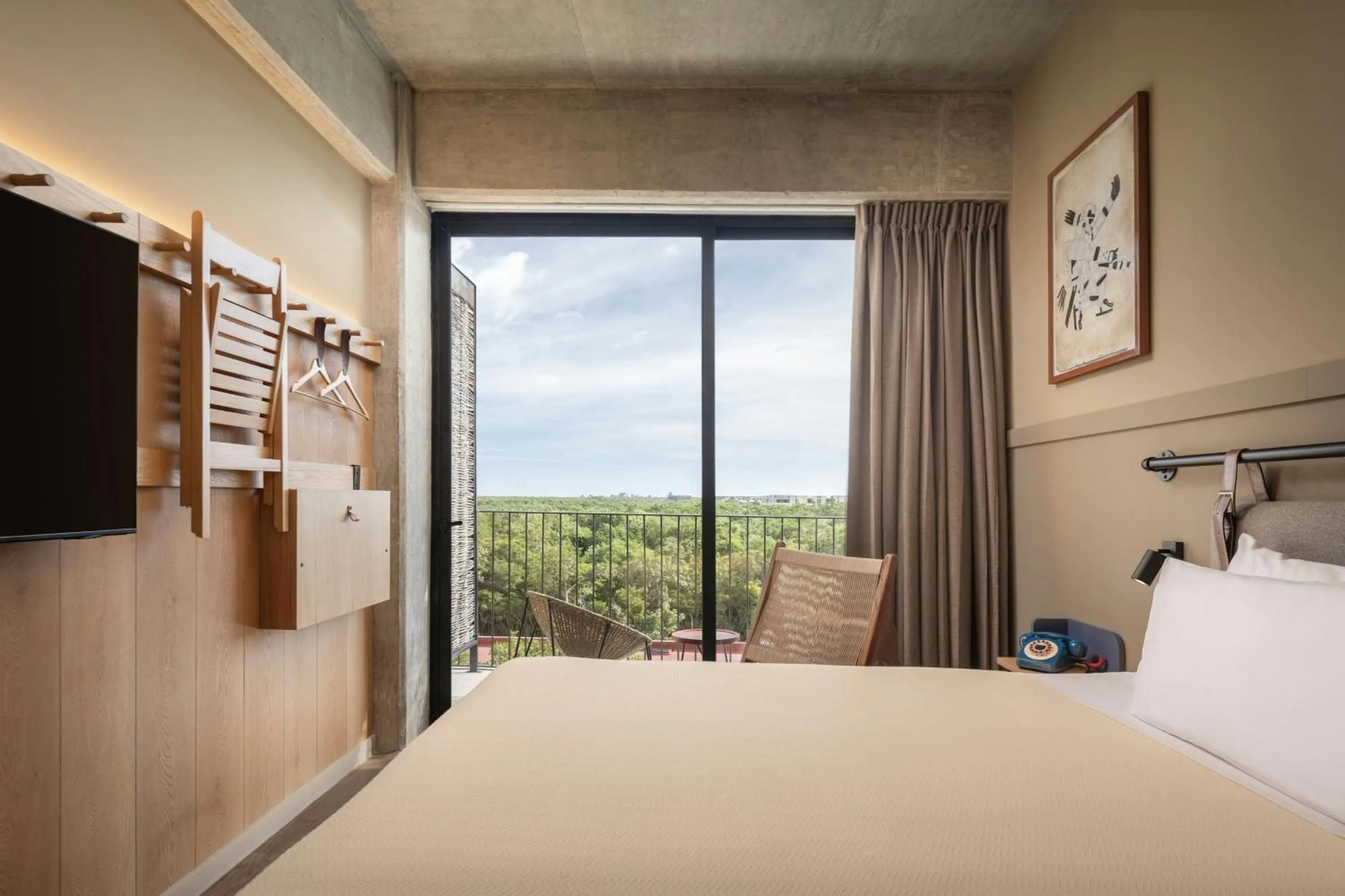 Photo of the whole room, Bed in Moxy Tulum