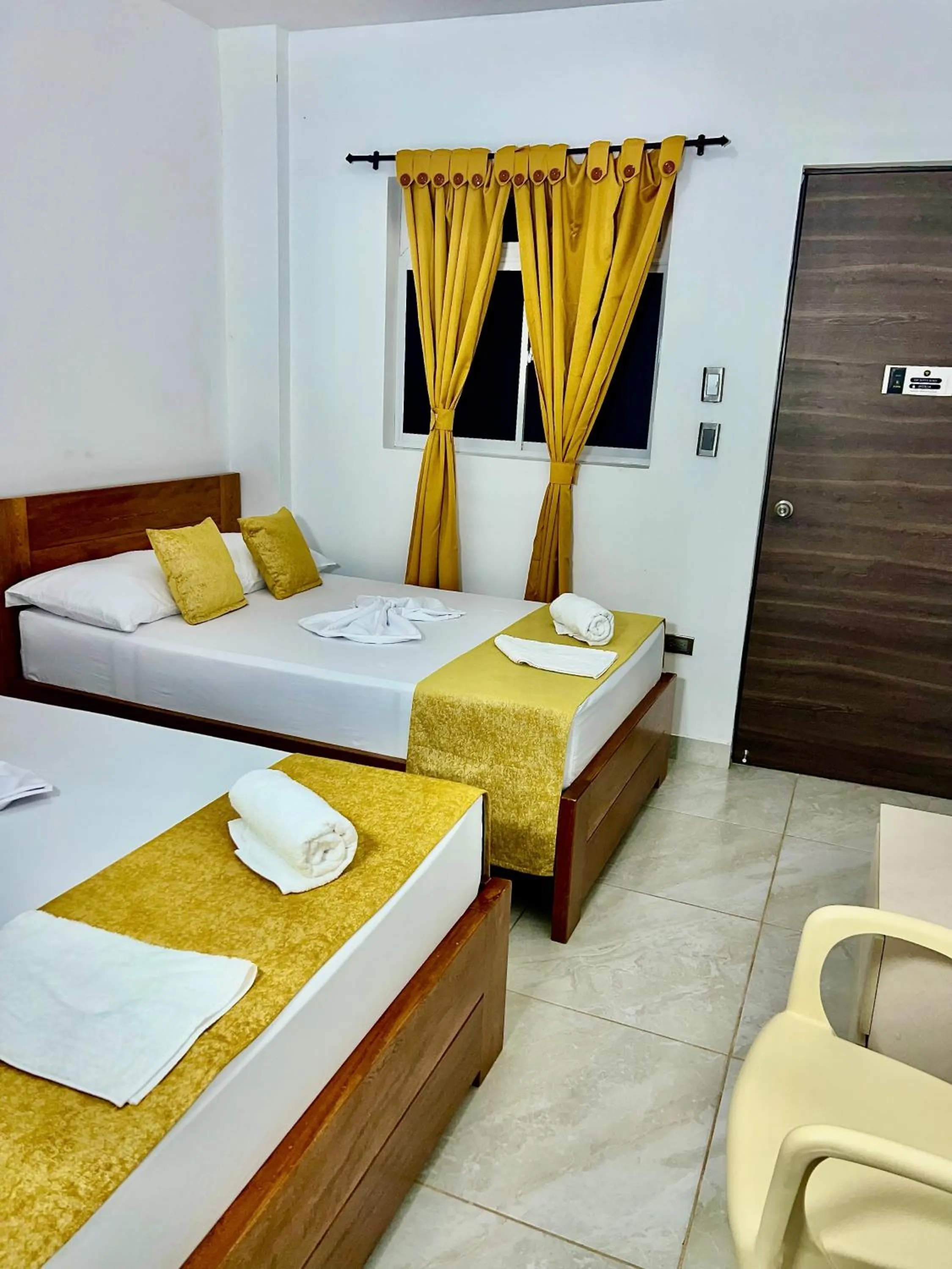 Photo of the whole room, Bed in Hotel Roma Urabá