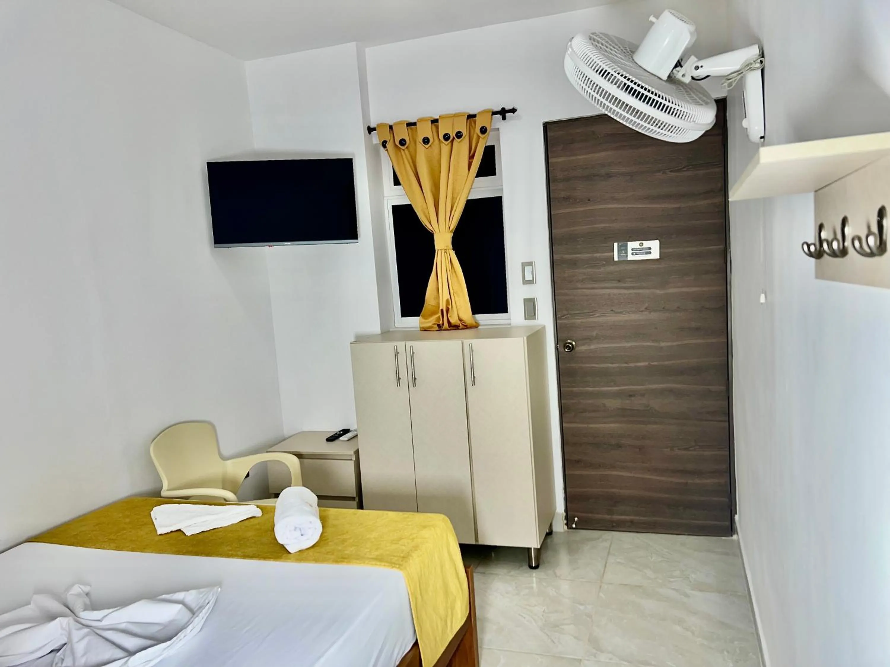 Photo of the whole room, Bed in Hotel Roma Urabá