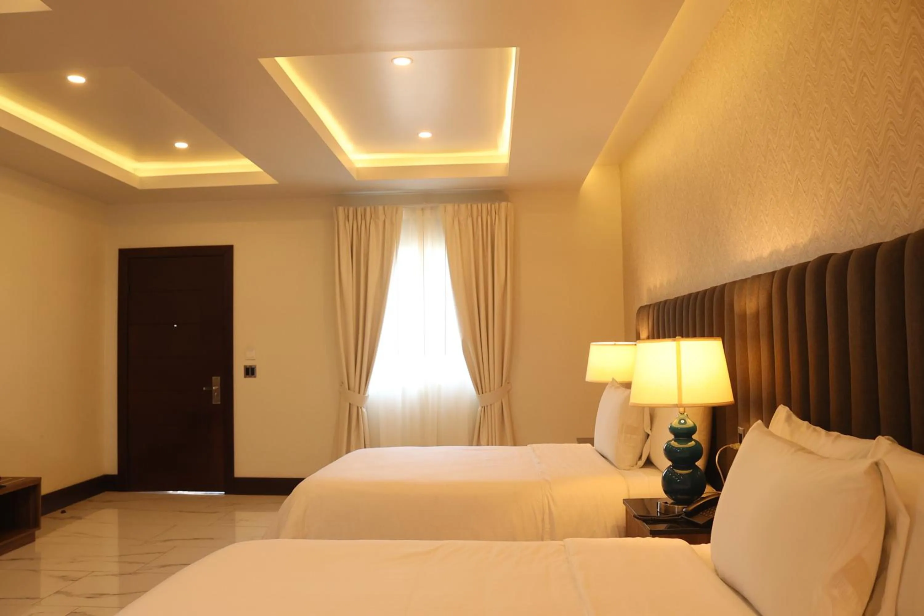 Bed in Hotel Hacienda Aguacaliente