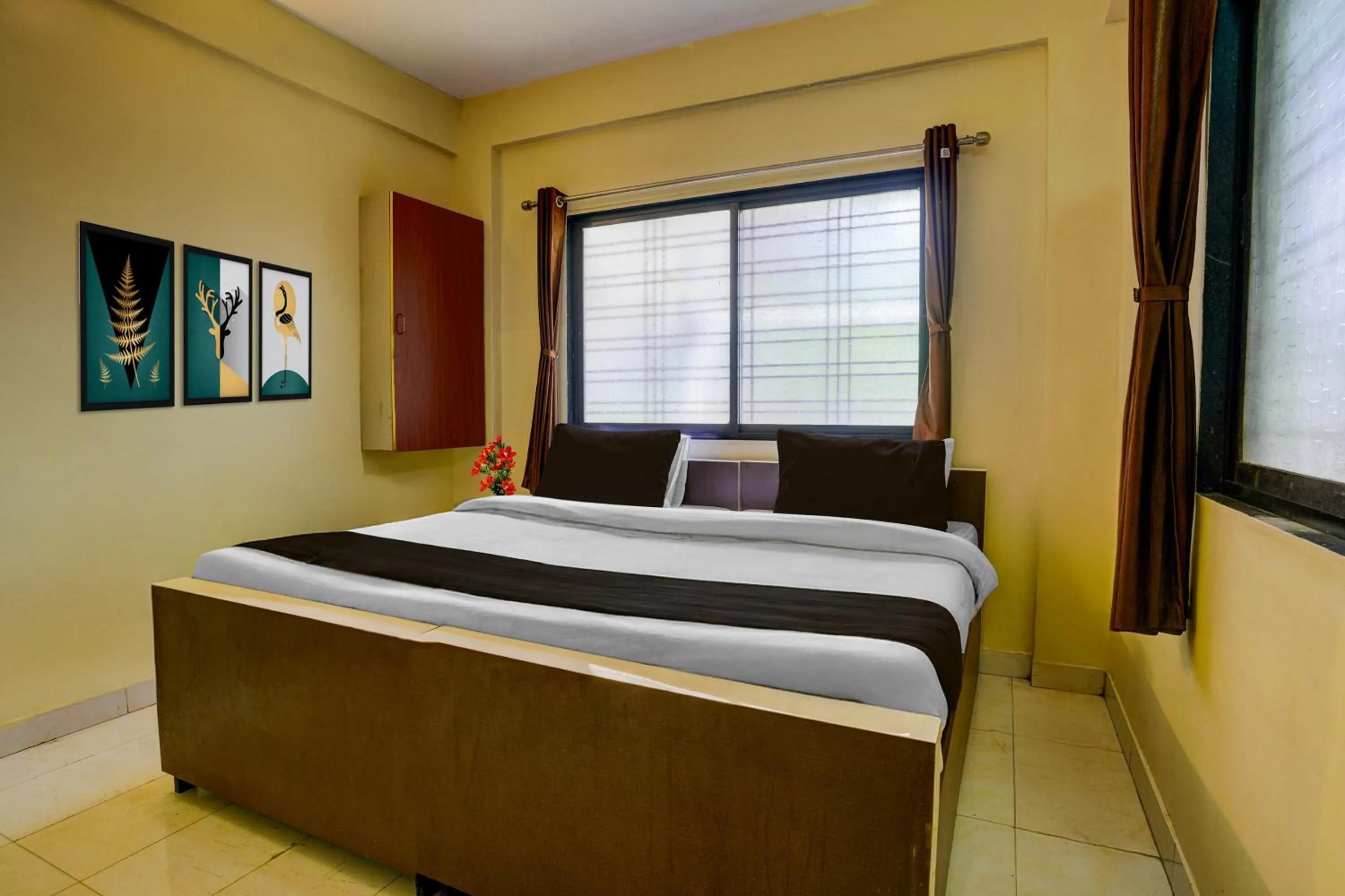 Bedroom, Bed in Hotel O Sainagar Shirdi Railway Junction Formerly Sai Vyankatesh Residency