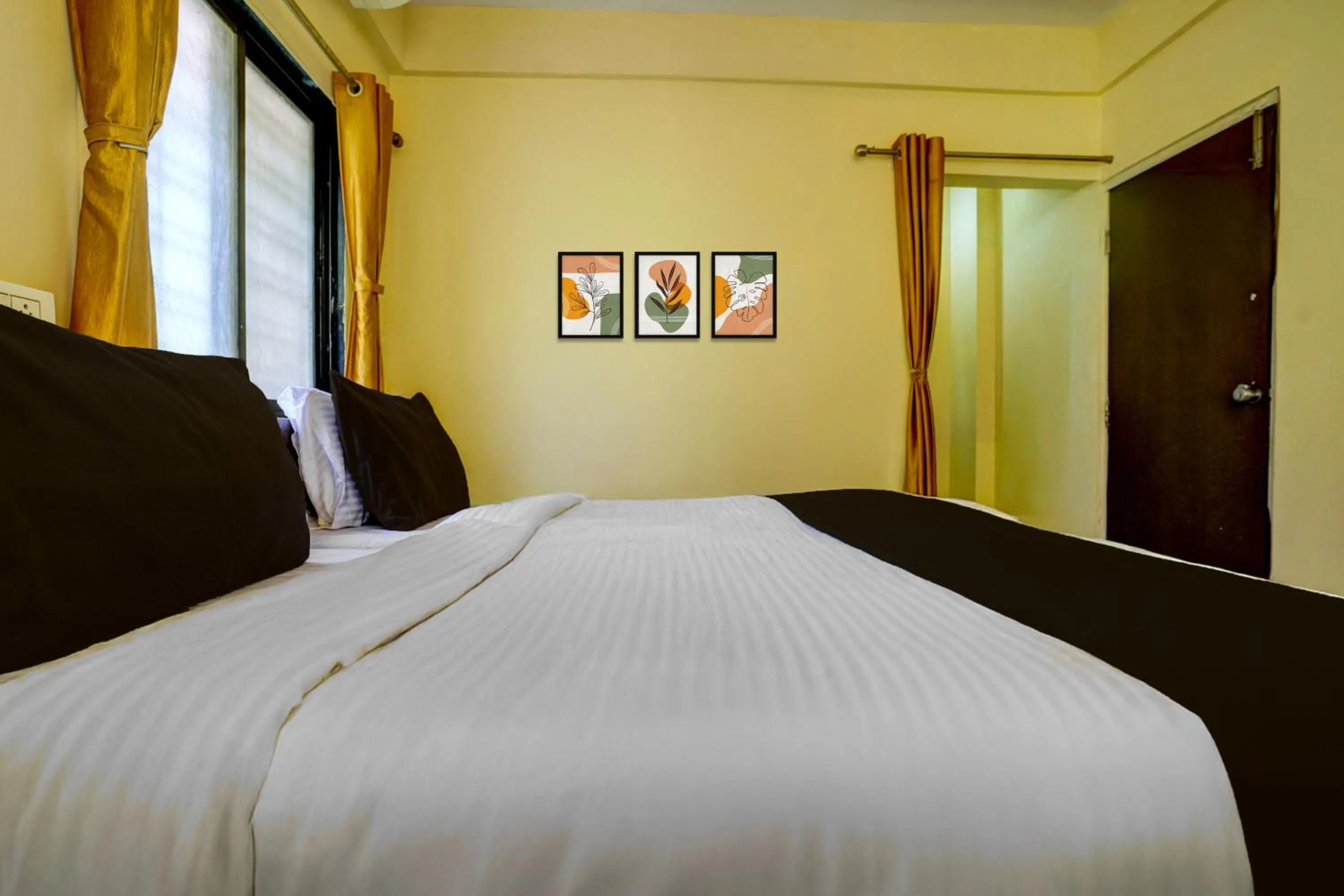 Bedroom, Bed in Hotel O Sainagar Shirdi Railway Junction Formerly Sai Vyankatesh Residency