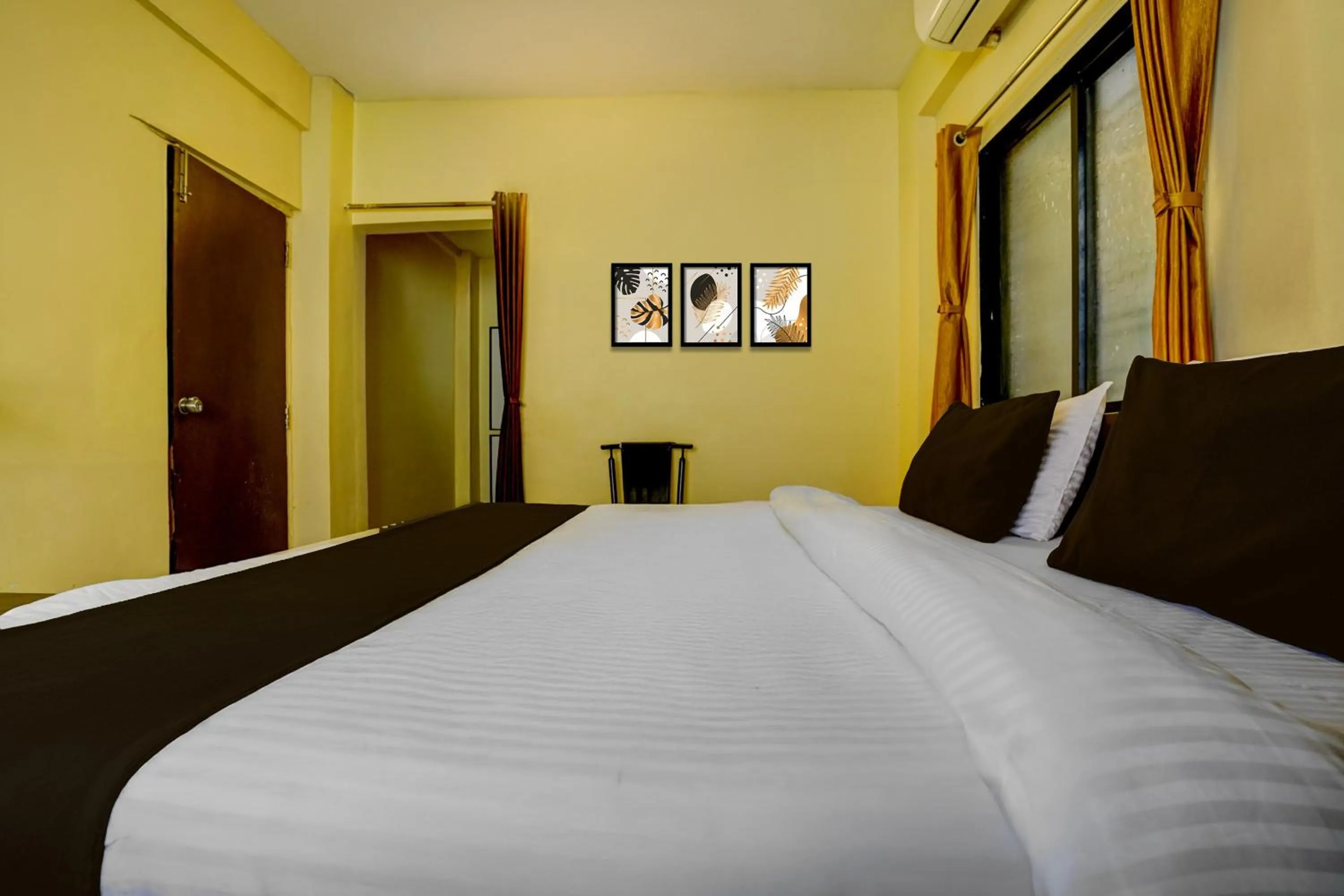 Bedroom, Bed in Hotel O Sainagar Shirdi Railway Junction Formerly Sai Vyankatesh Residency