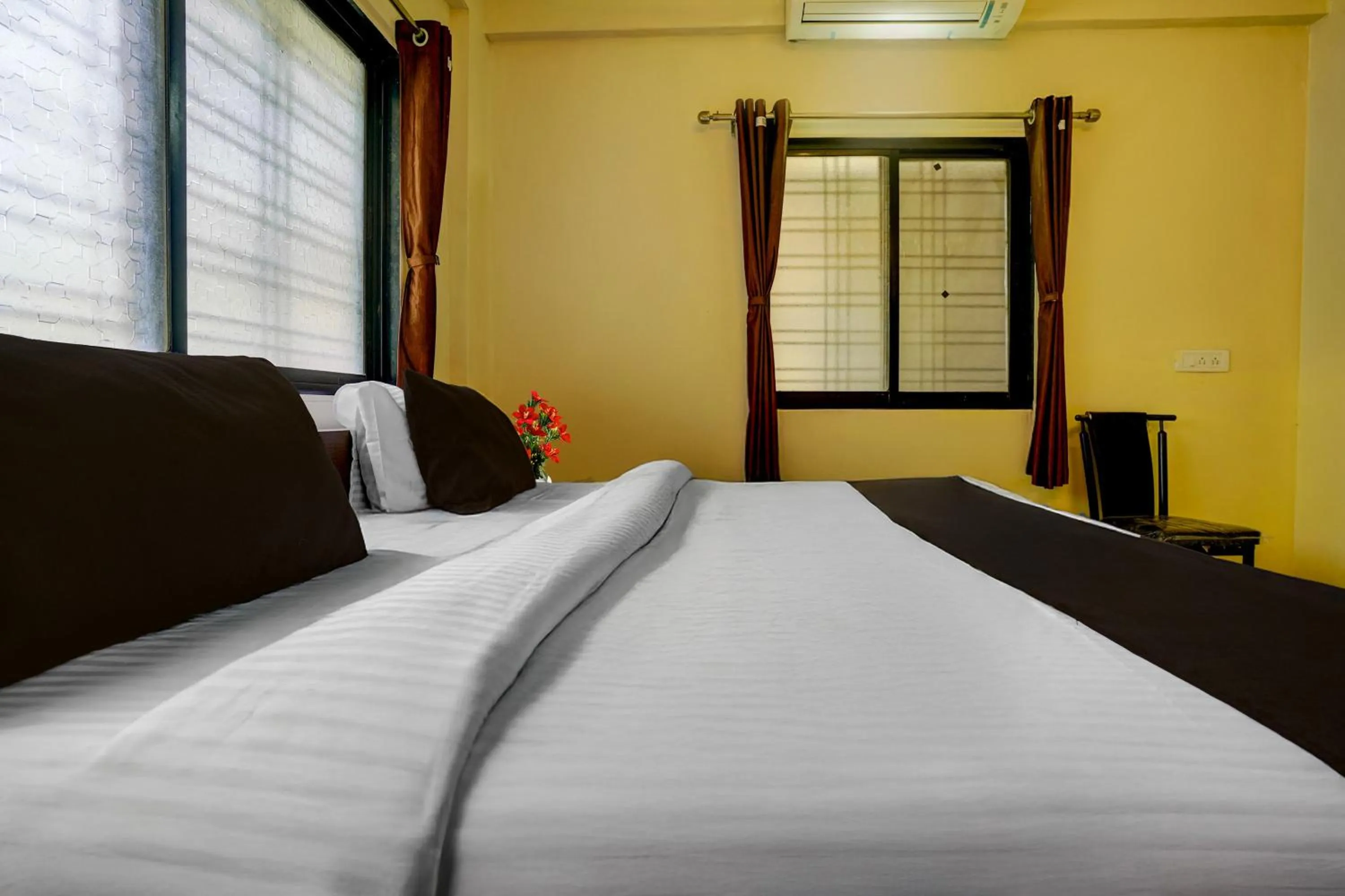 Bedroom, Bed in Hotel O Sainagar Shirdi Railway Junction Formerly Sai Vyankatesh Residency