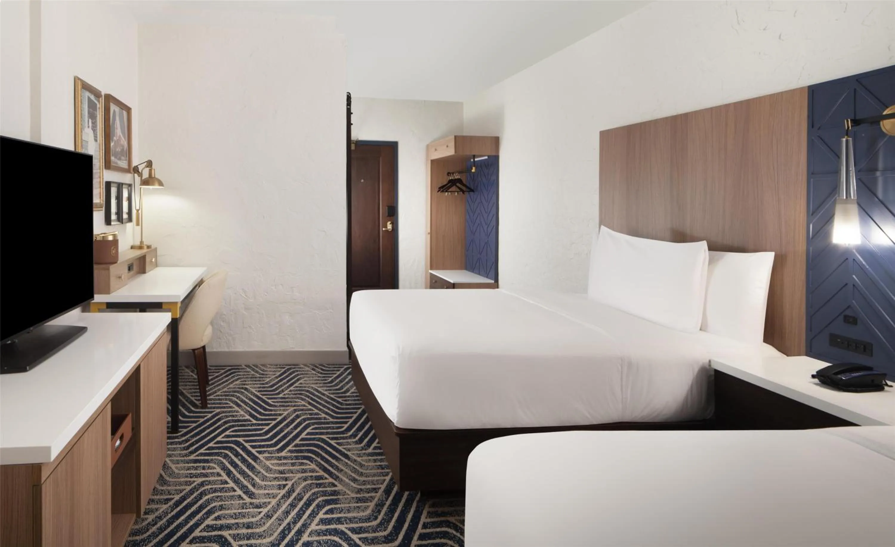 Bed in Hotel Royer Urbana Champaign, Tapestry Collection by Hilton