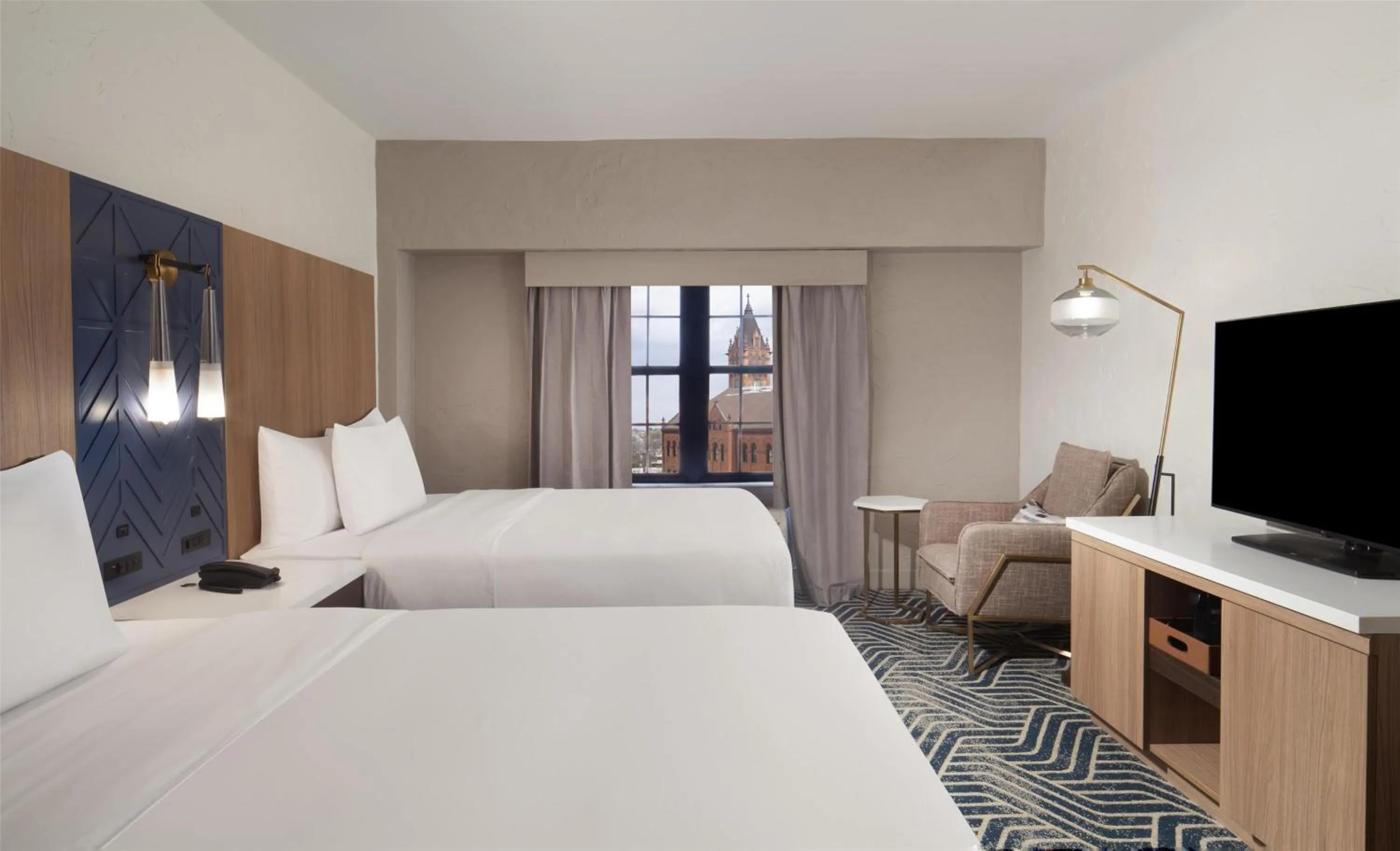 Bed in Hotel Royer Urbana Champaign, Tapestry Collection by Hilton