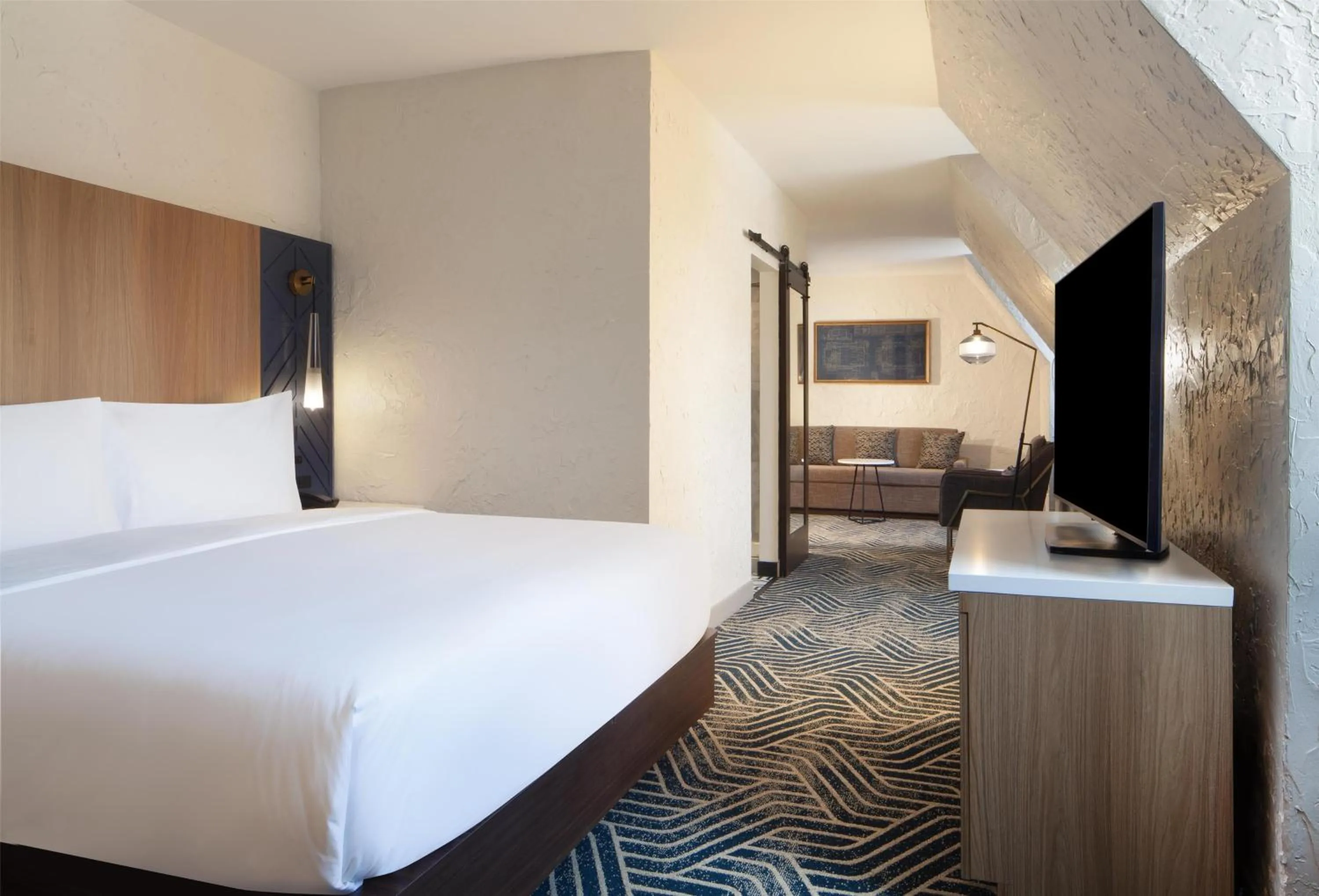 Bed in Hotel Royer Urbana Champaign, Tapestry Collection by Hilton