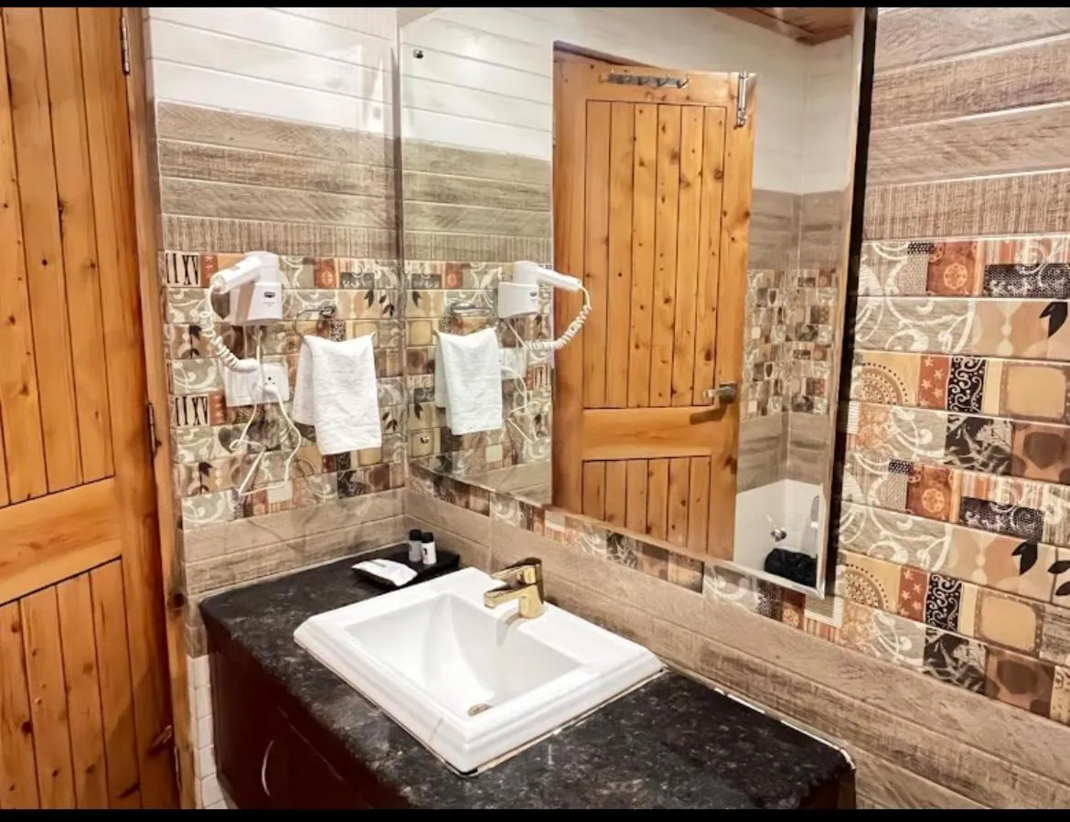 Bathroom in Azure Chandertal Regency Hotel And Spa