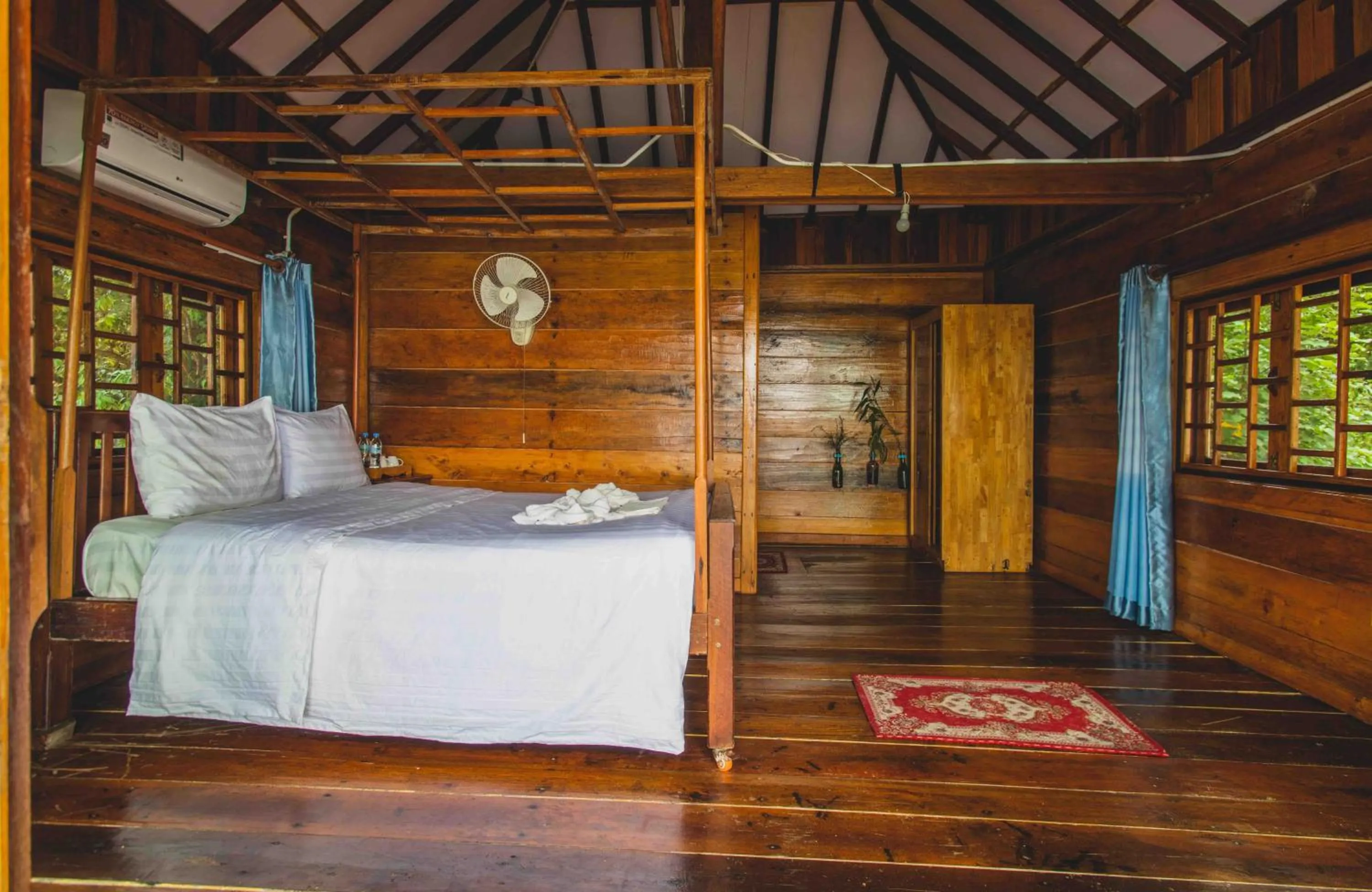 Bed in Tree House Bungalows
