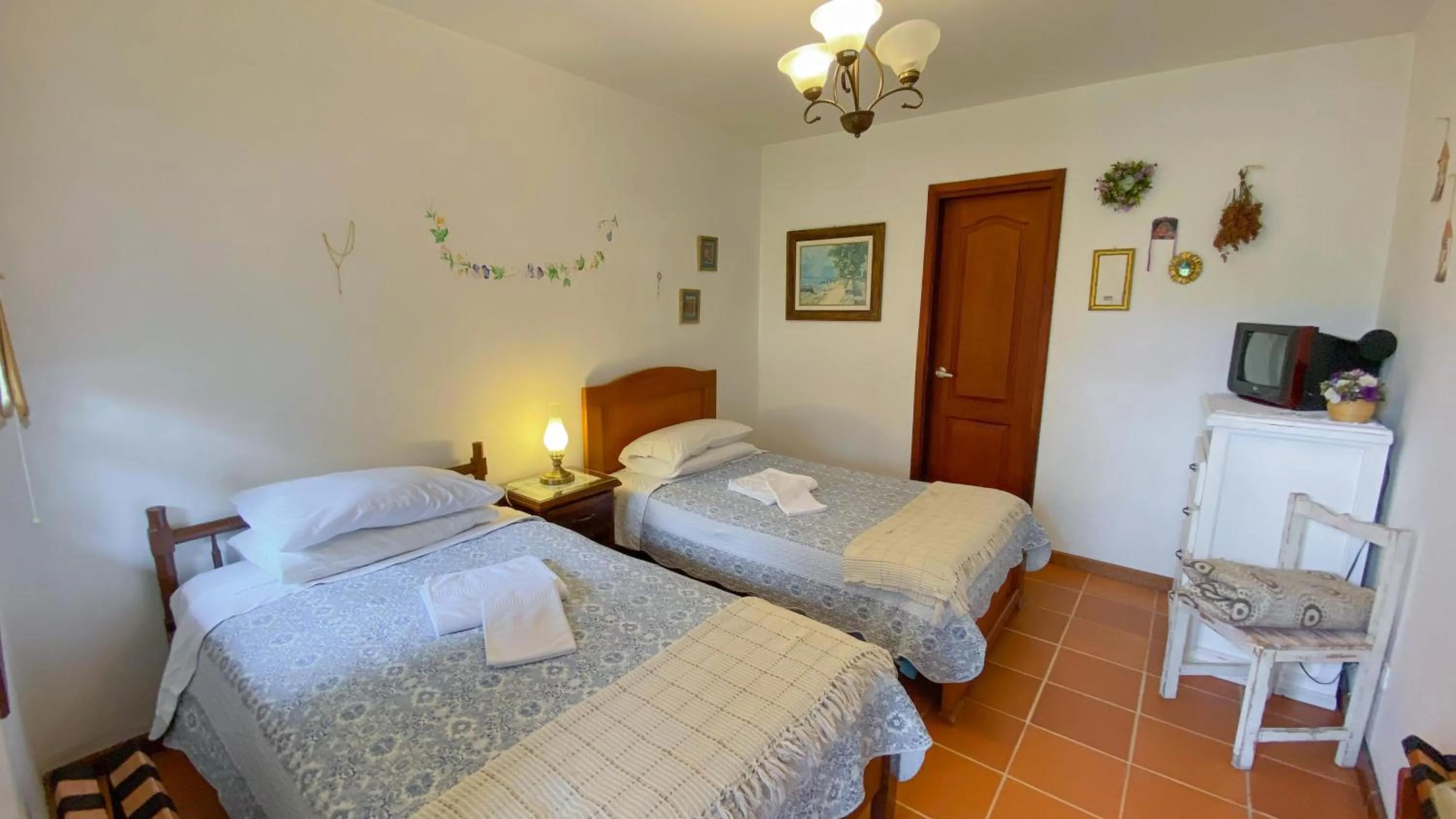 Photo of the whole room, Bed in Sakti Hostal B&B