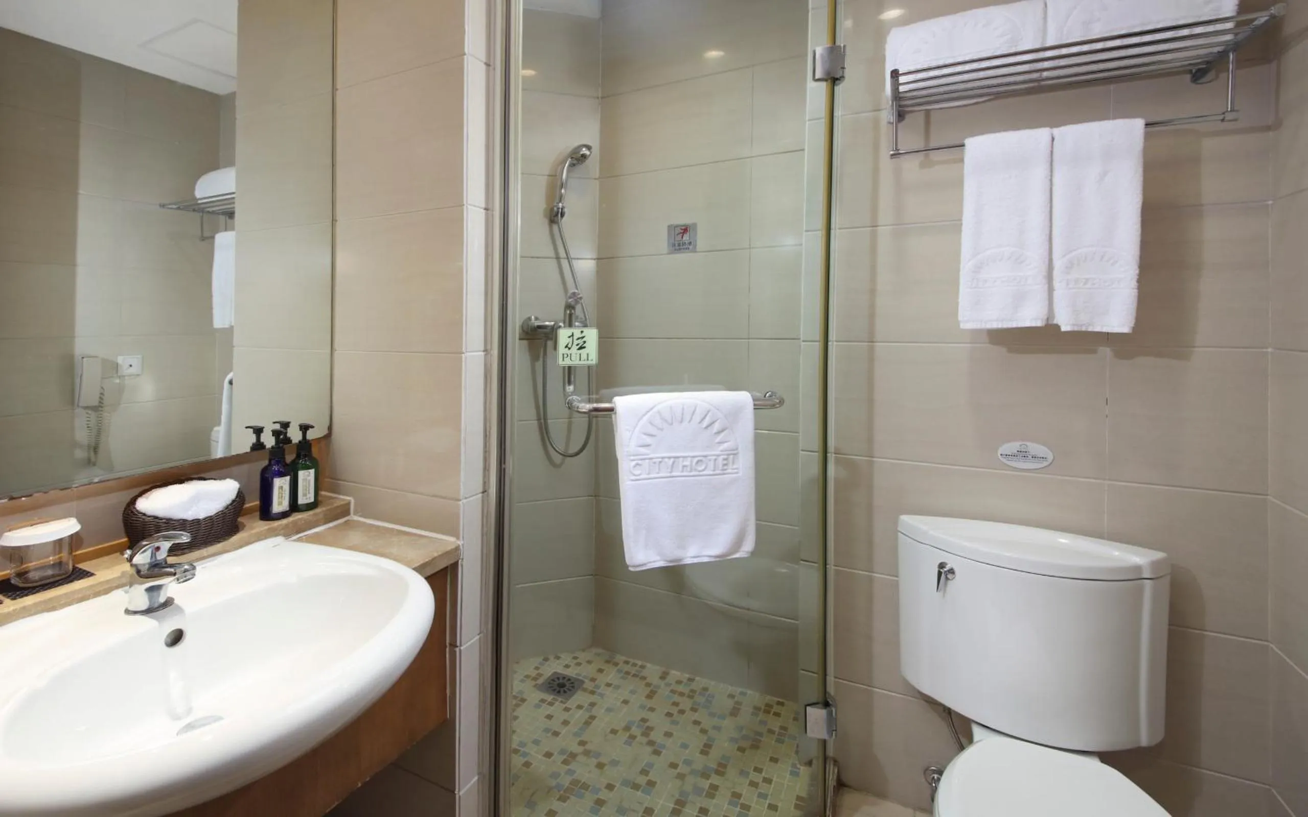 Toilet in City Hotel Xiamen-Free Welcome Fruits