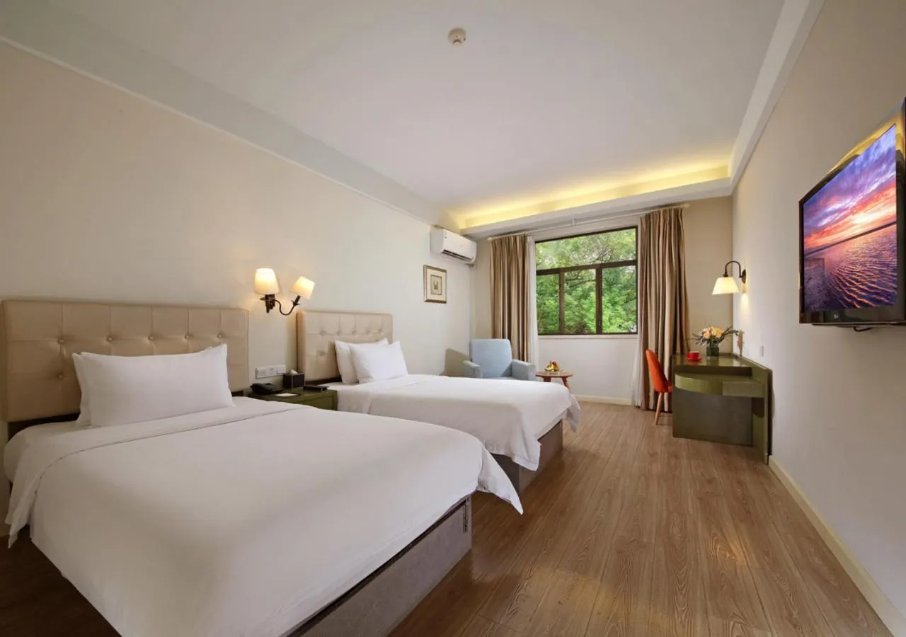Bedroom, Bed in City Hotel Xiamen-Free Welcome Fruits