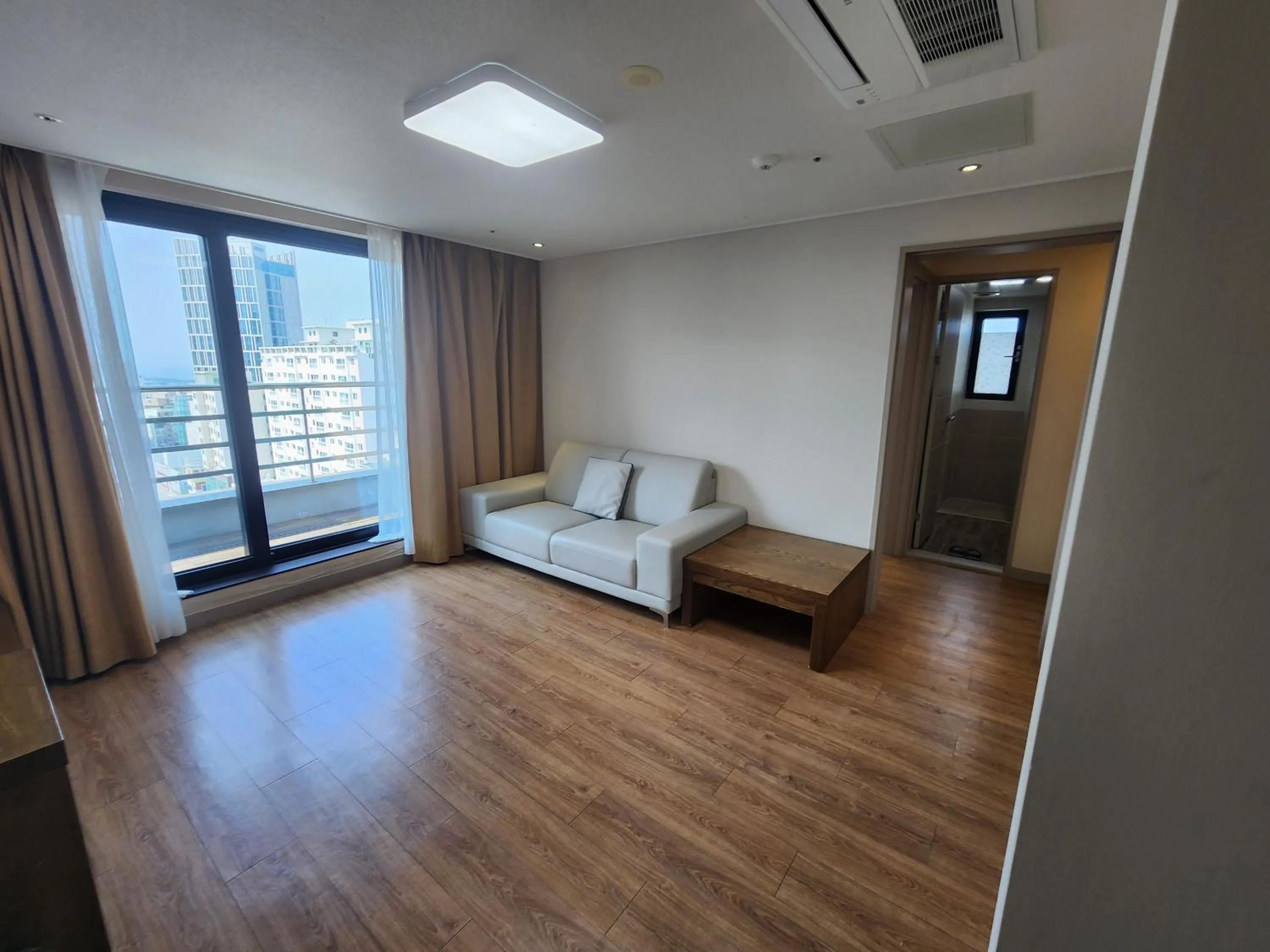 Living room, Bed in Hotel Haema