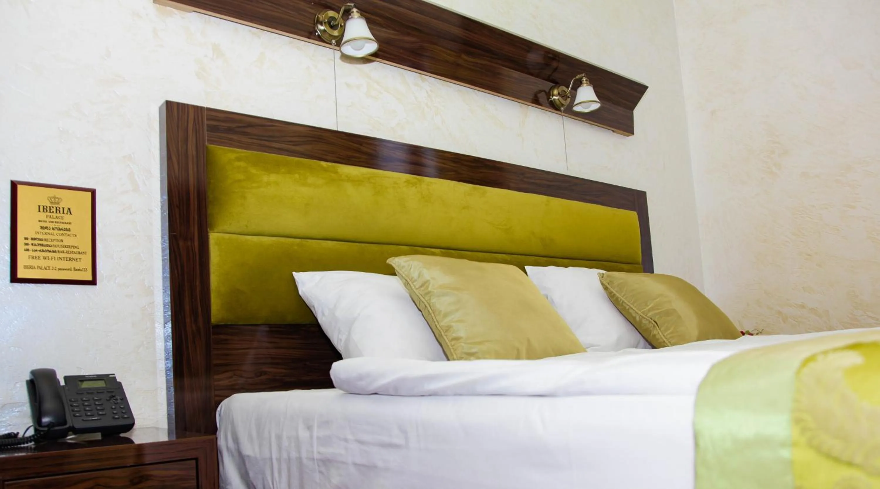 Bed in Iberia Palace Hotel