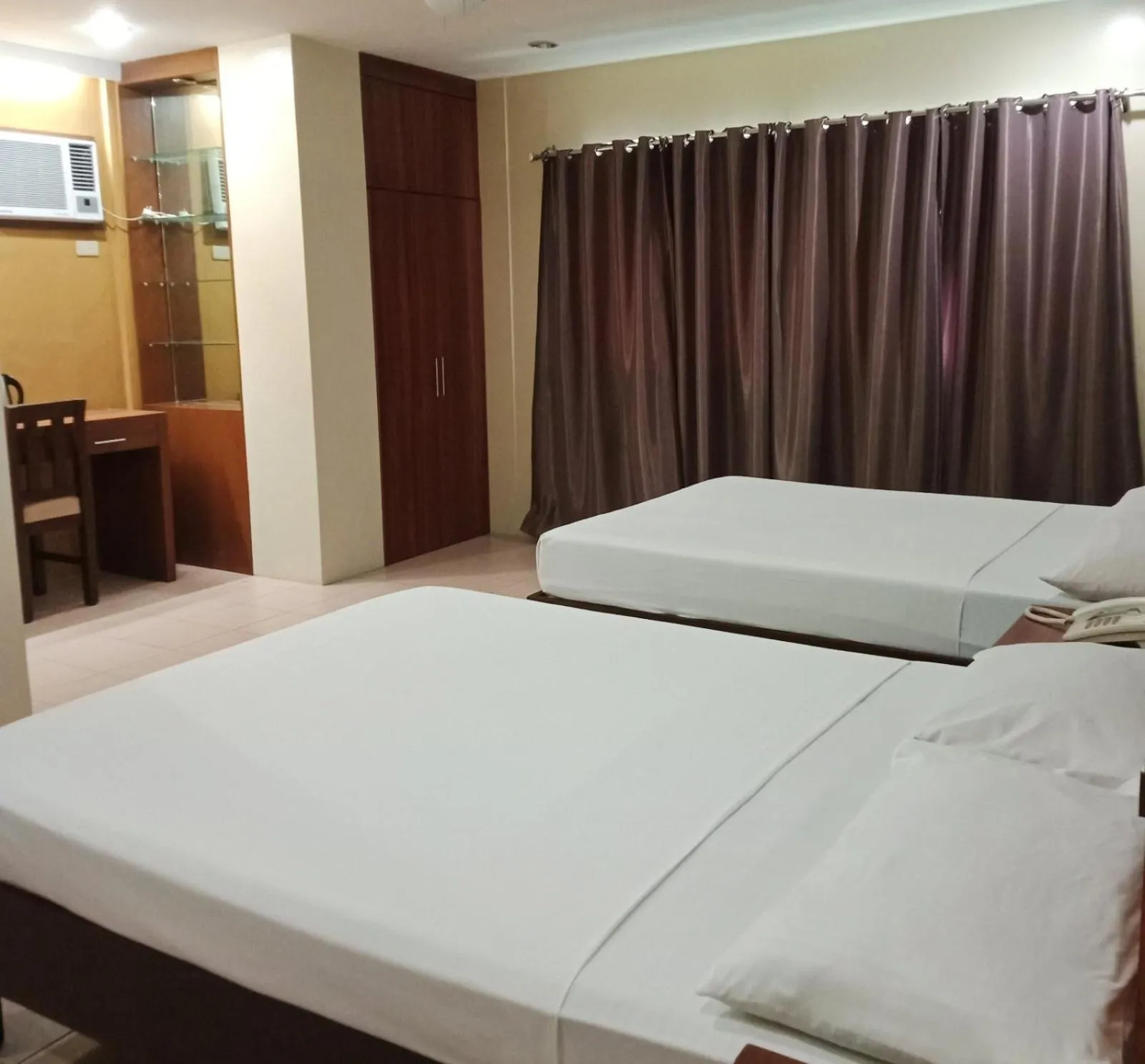 Bed in Joyce Apartelle Mandaluyong
