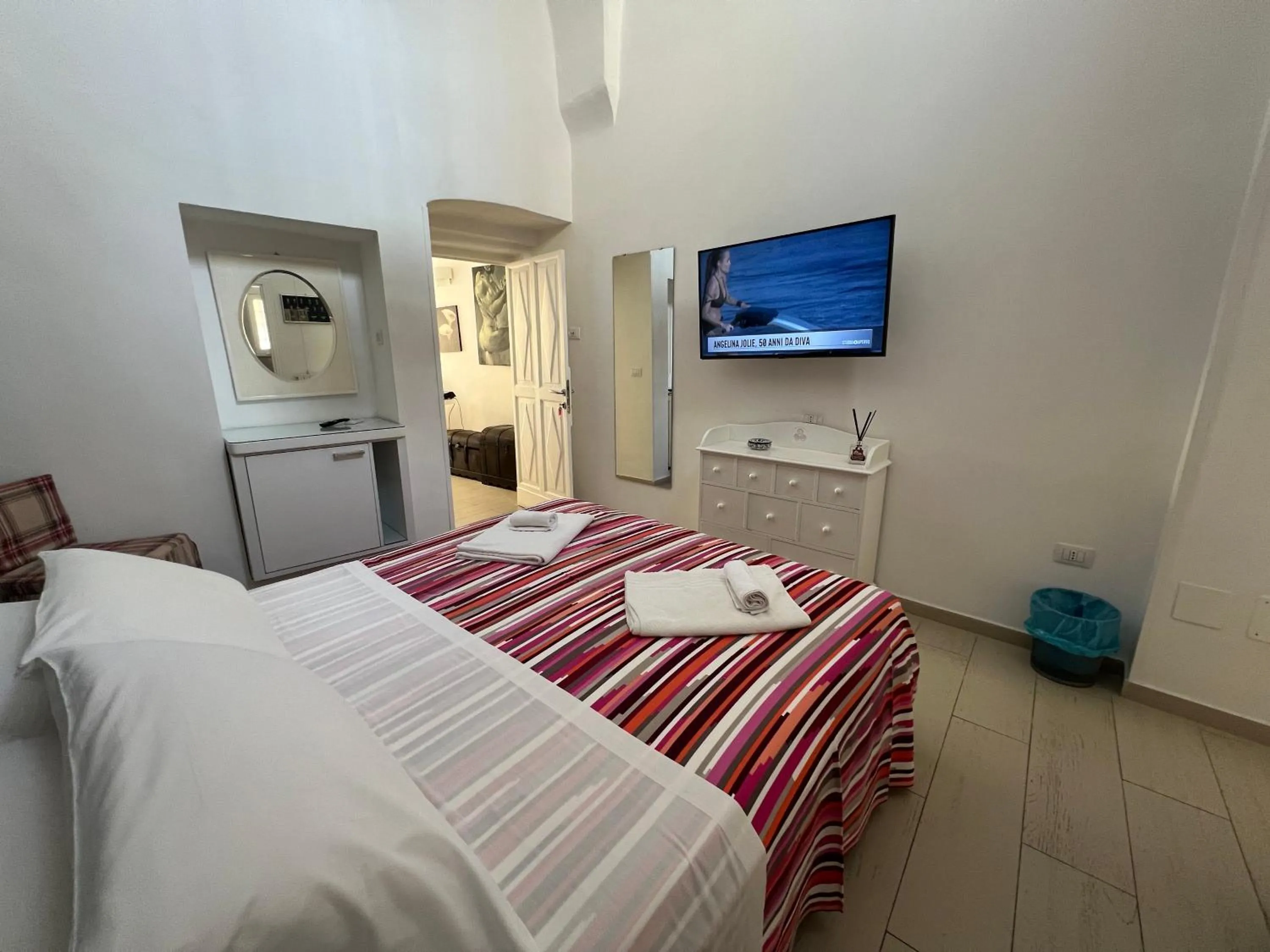 Bed in Elamar Rooms & Apartment