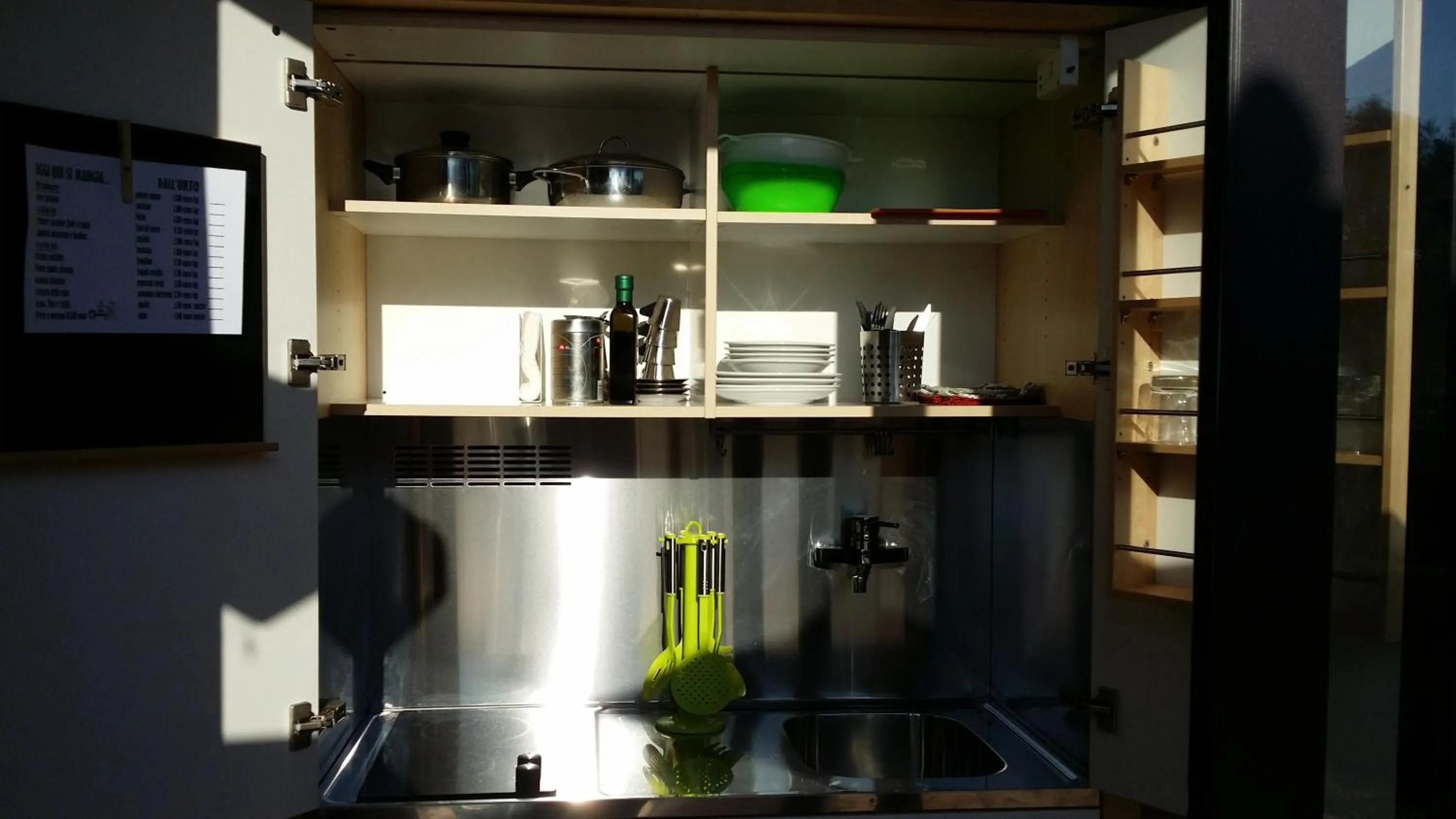 Communal kitchen in Il Giardino nell'Orto