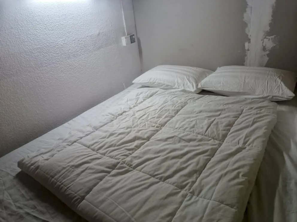 Bed in Cool view budget hotel