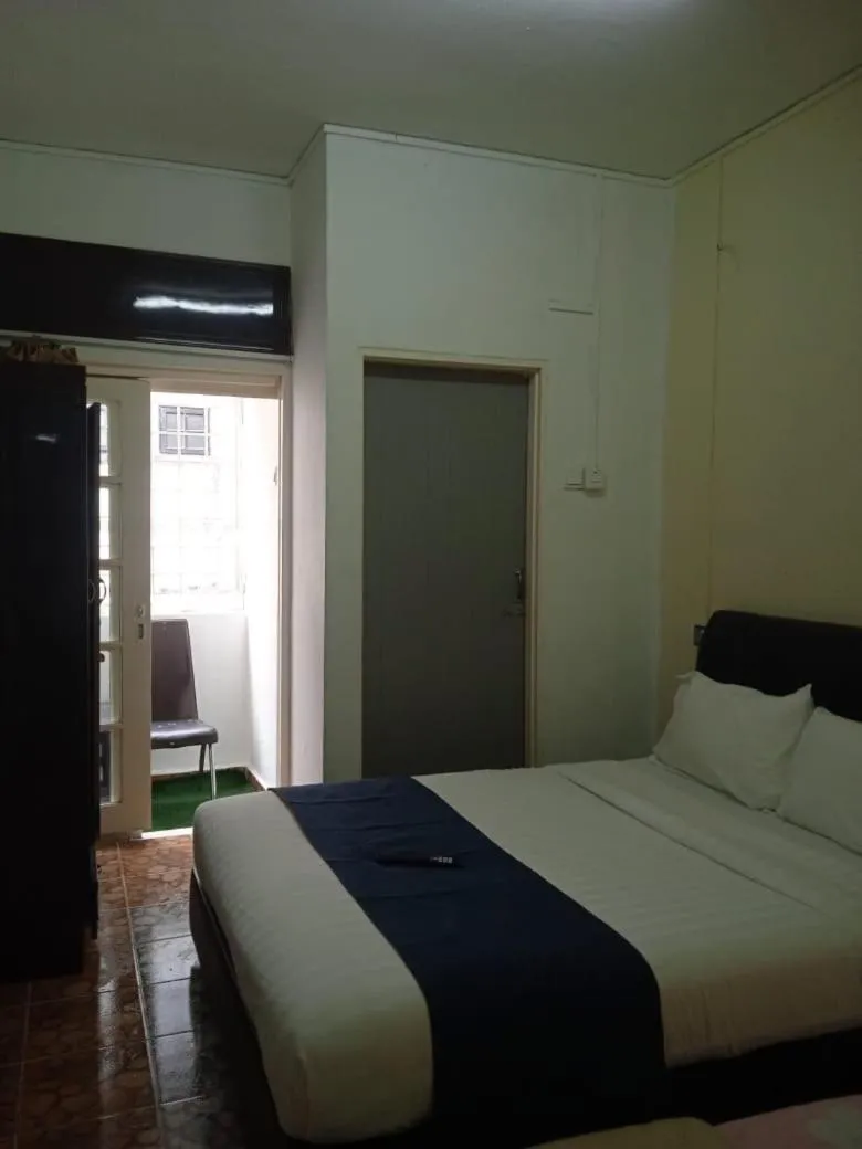 Bed in Cool view budget hotel