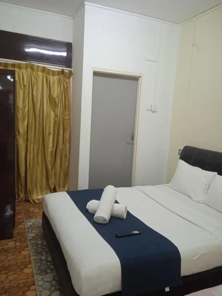 Bed in Cool view budget hotel