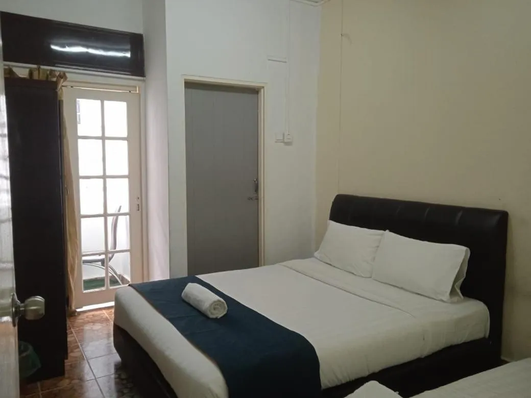 Bed in Cool view budget hotel