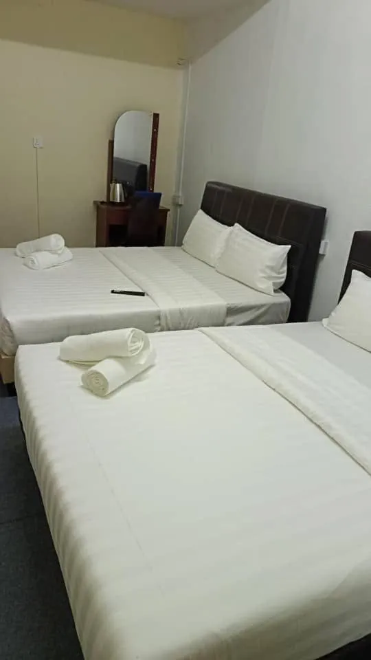 Bed in Cool view budget hotel