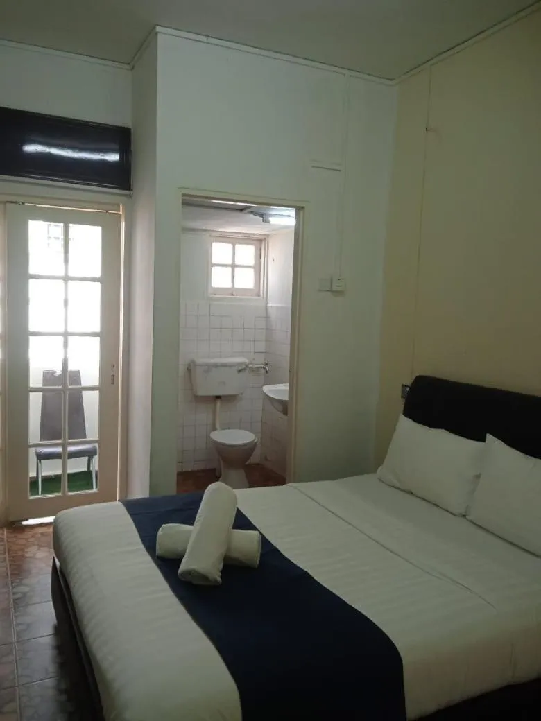 Bed in Cool view budget hotel