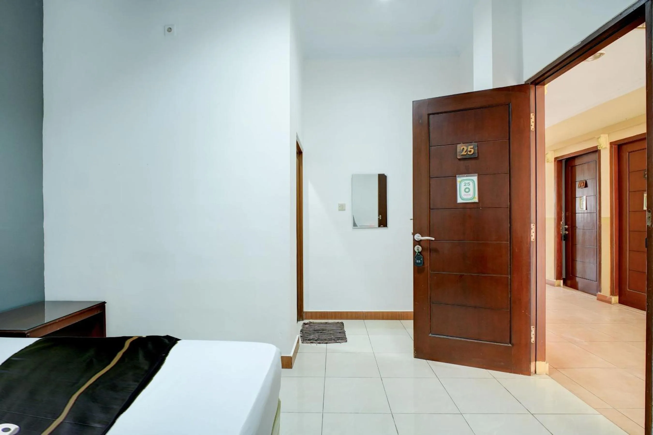 Photo of the whole room, Bed in Hotel O Depok near Bhayangkara BRIMOB Hospital Formerly Hotel Mutiara Kelapa Dua Depok