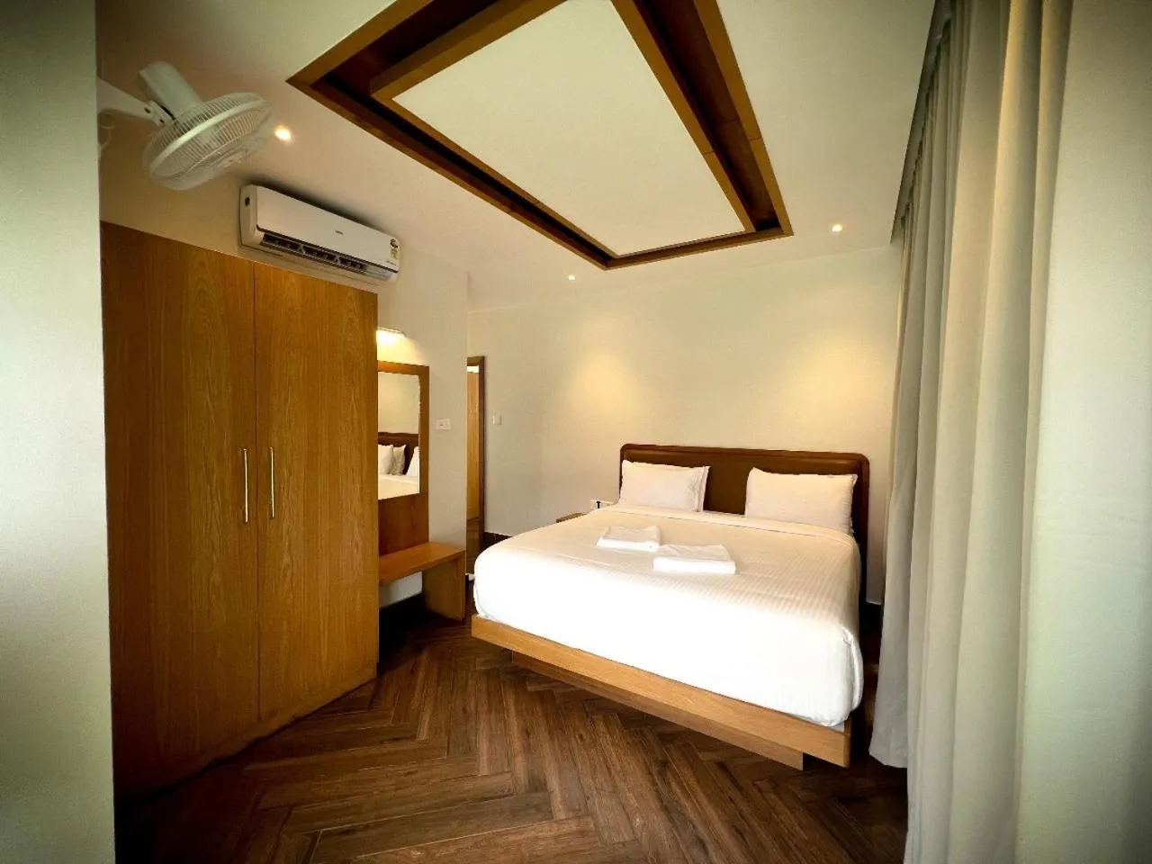 Bed in Talenresort Vythiri Villas