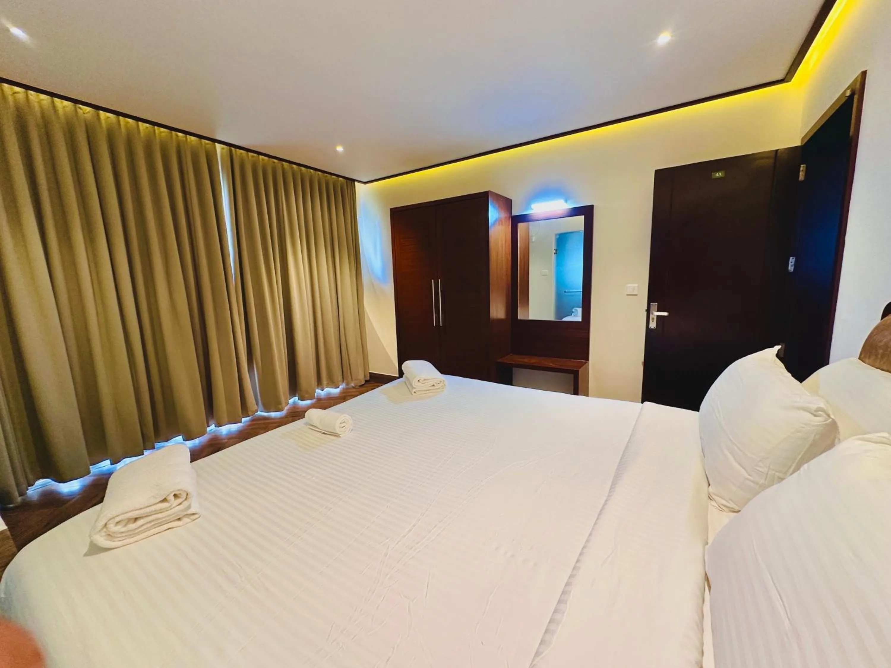 Bed in Talenresort Vythiri Villas