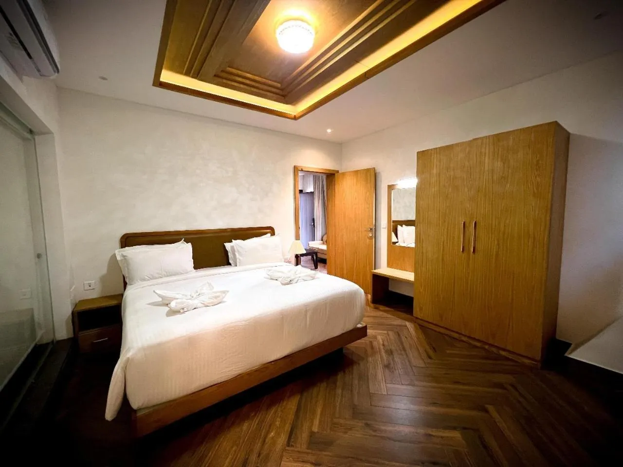 Bed in Talenresort Vythiri Villas