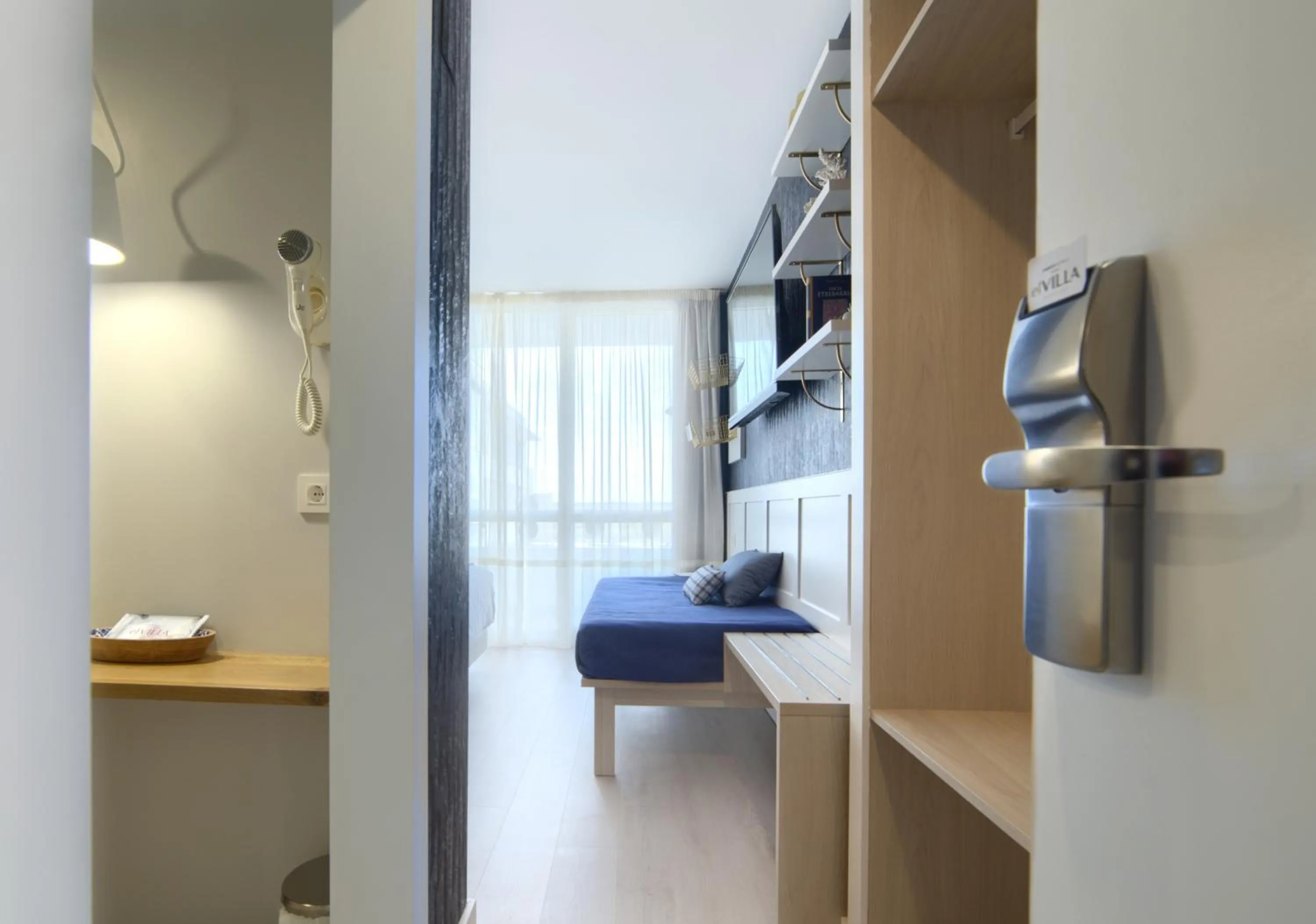 Bed in Hotel Luze El Villa