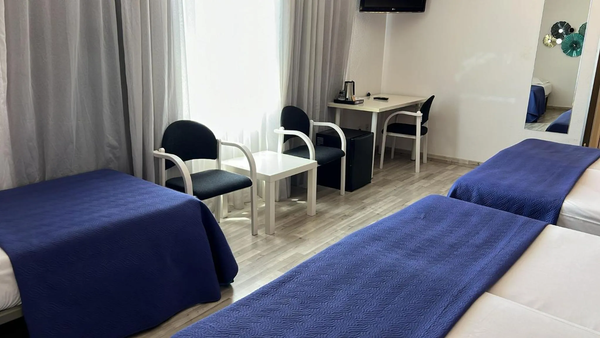 Bed in Hotel Luze El Villa