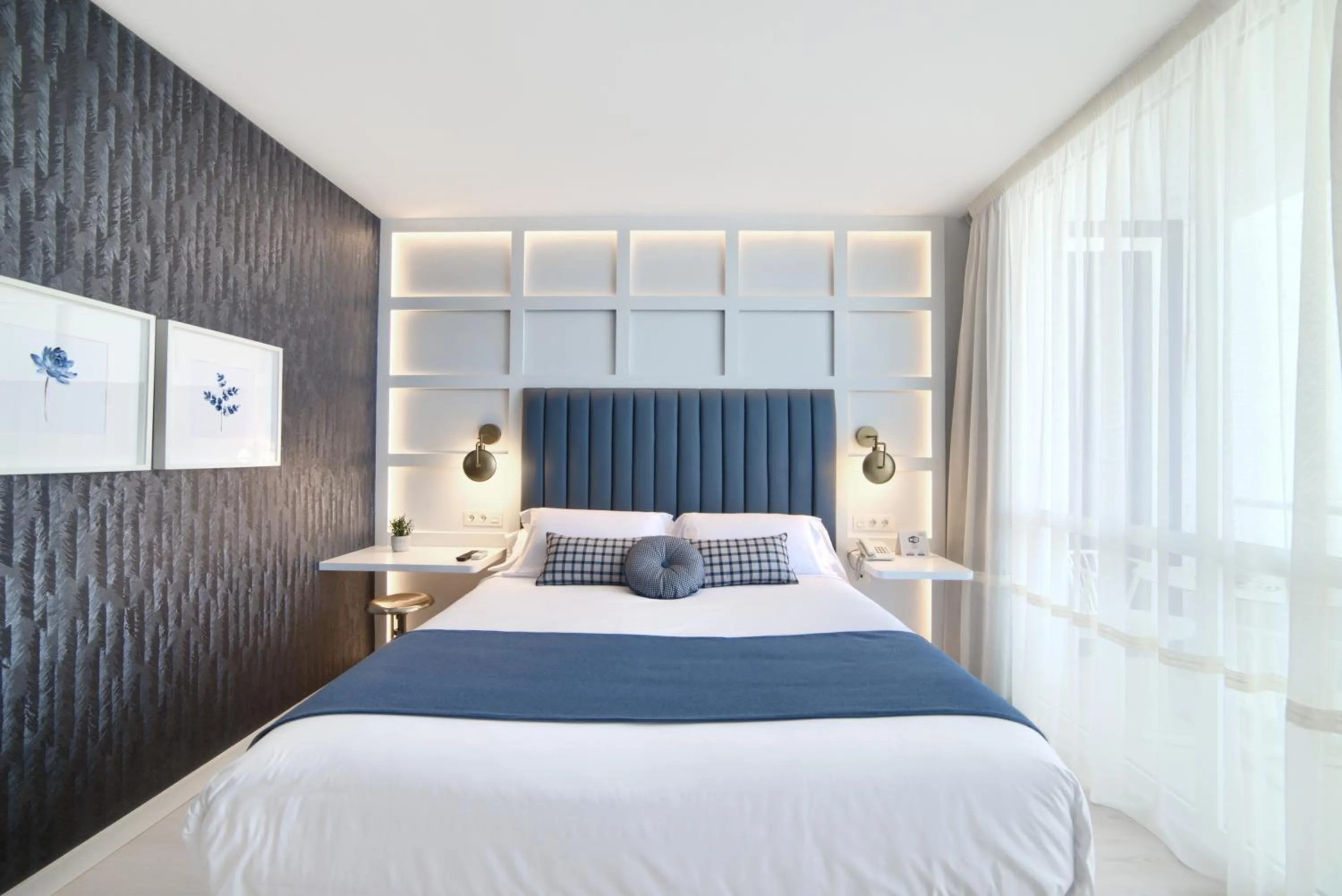 Bed in Hotel Luze El Villa