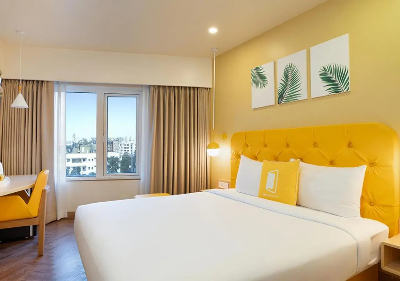 Standard King Room - single occupancy in Bloom Hub l WEH Andheri Standard King Room - single occupancy in Bloom Hub l WEH Andheri