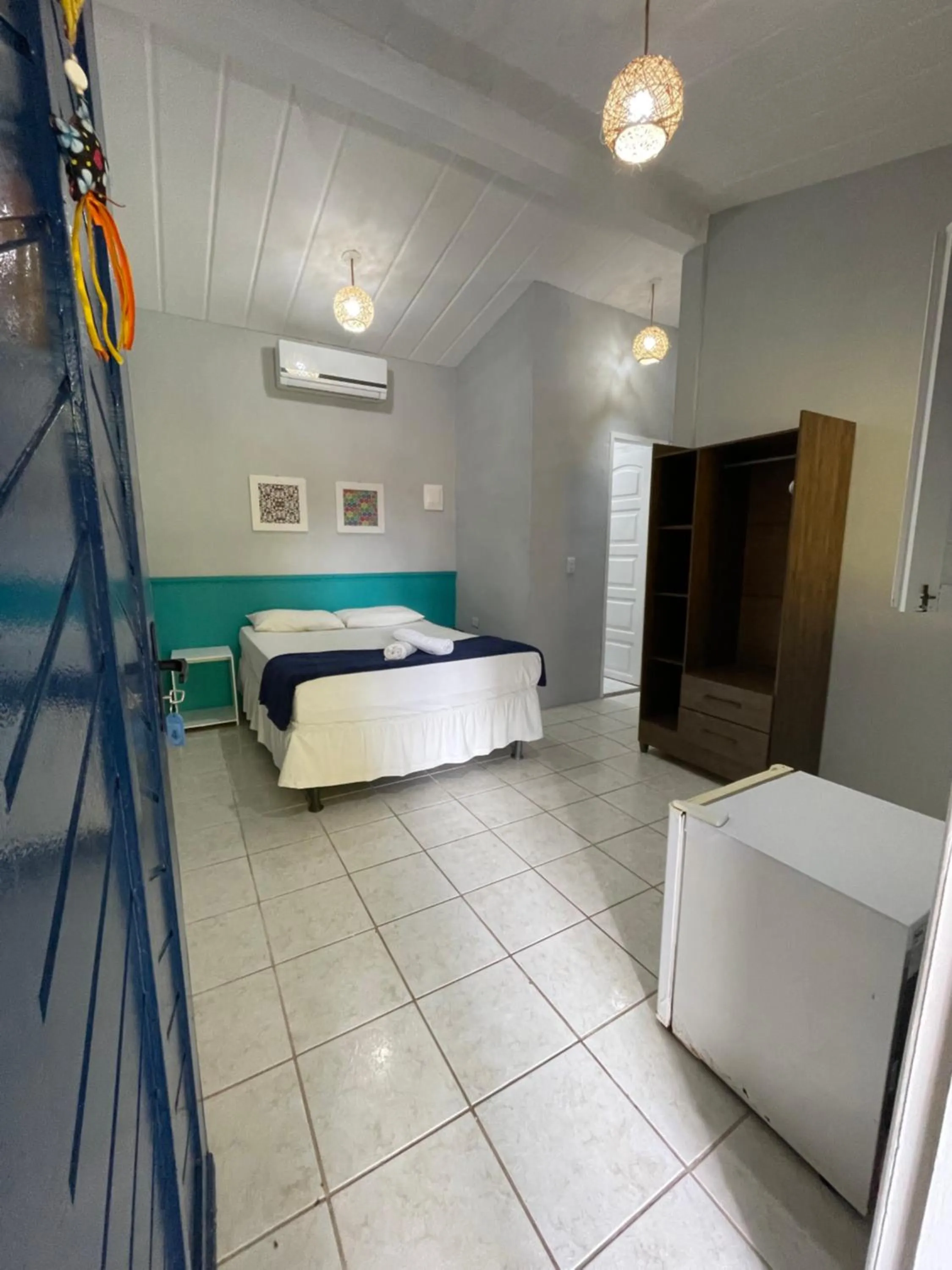 Bed in Pousada Girassol