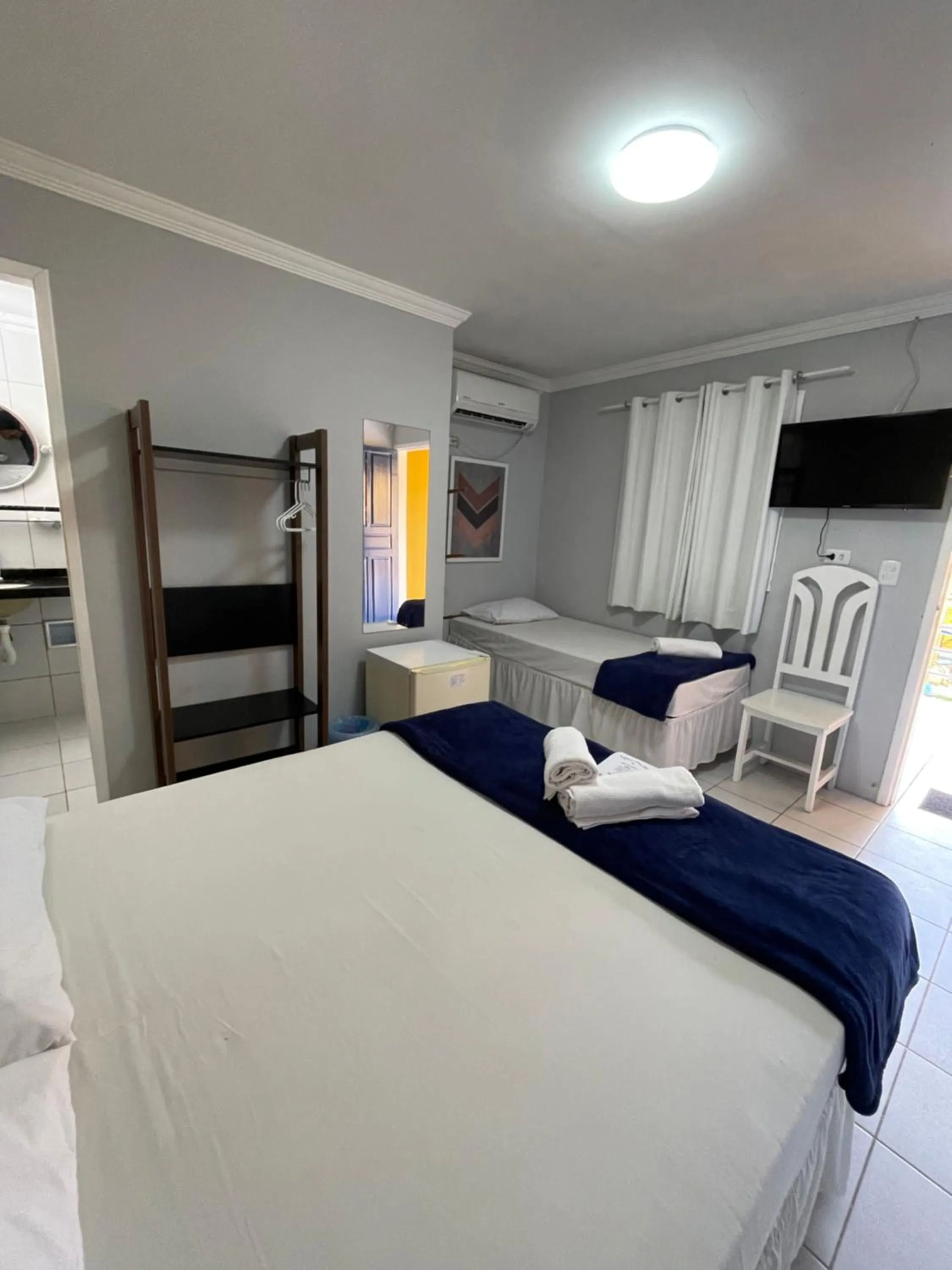 Bed in Pousada Girassol