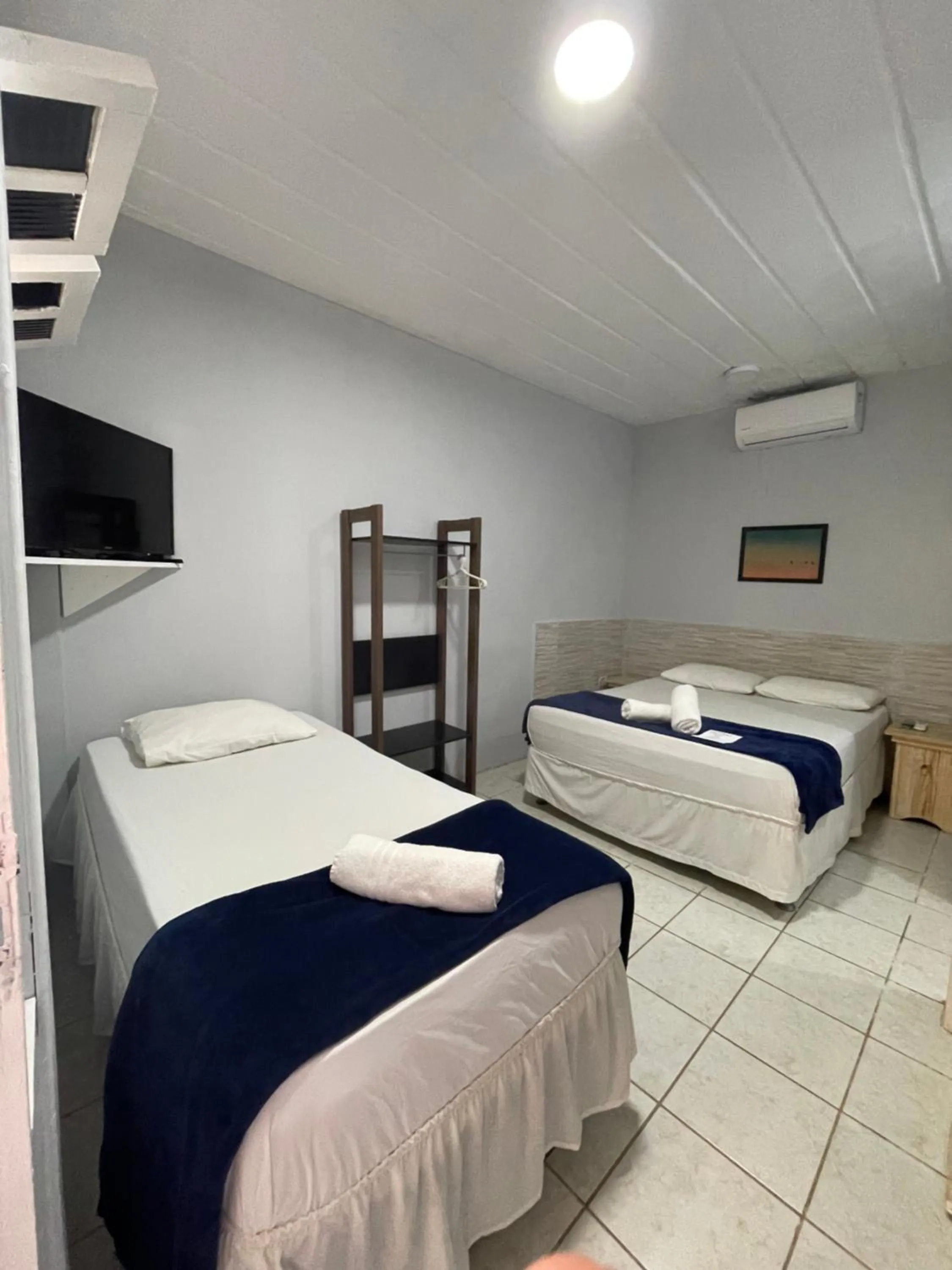 Bed in Pousada Girassol