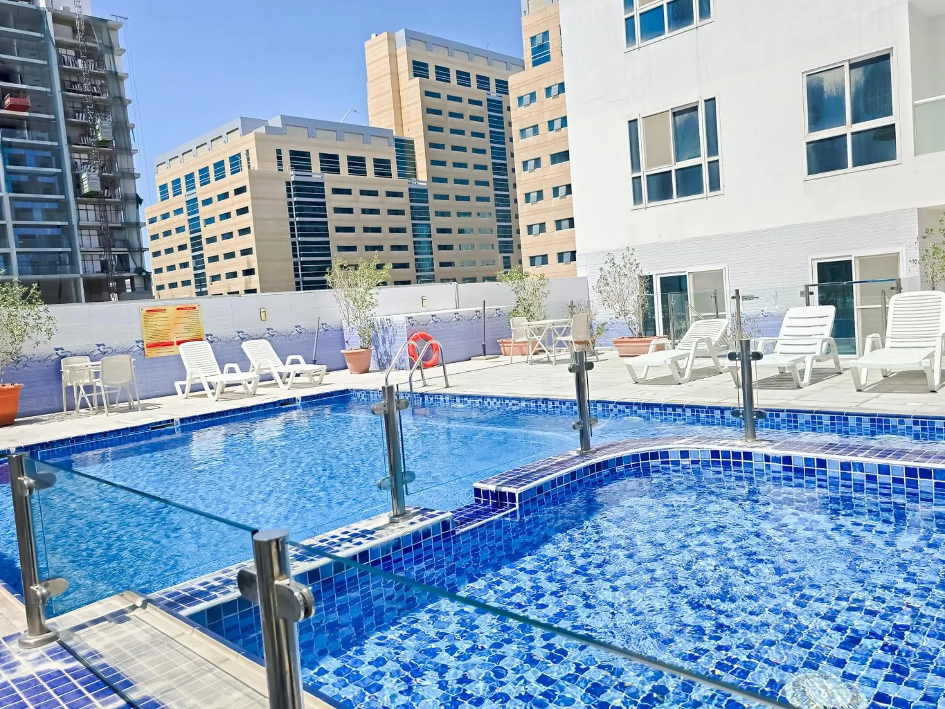 Swimming pool in MK Residence JVC