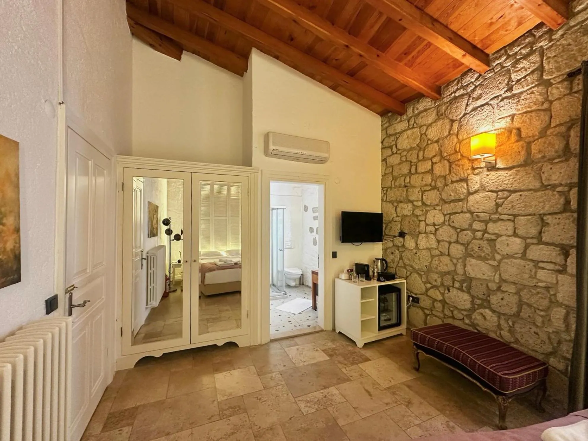 Bed in La Grenadine Hotel