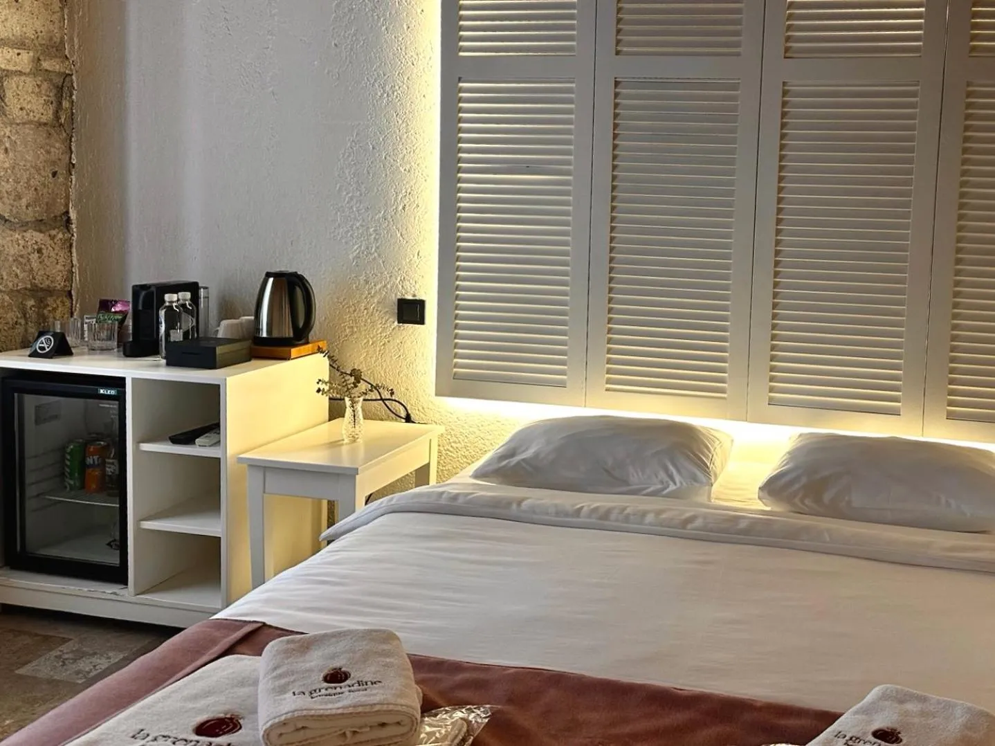 Bed in La Grenadine Hotel