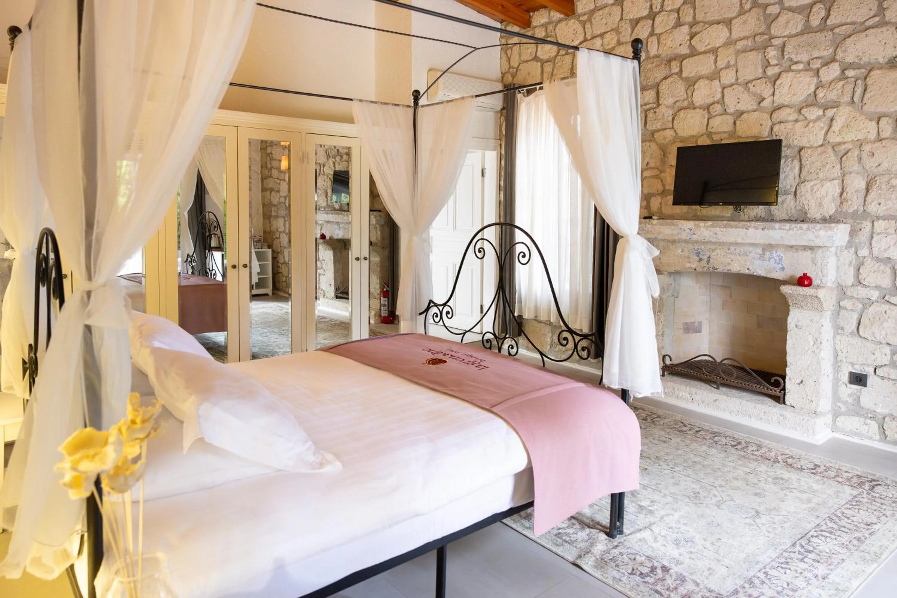 Bed in La Grenadine Hotel