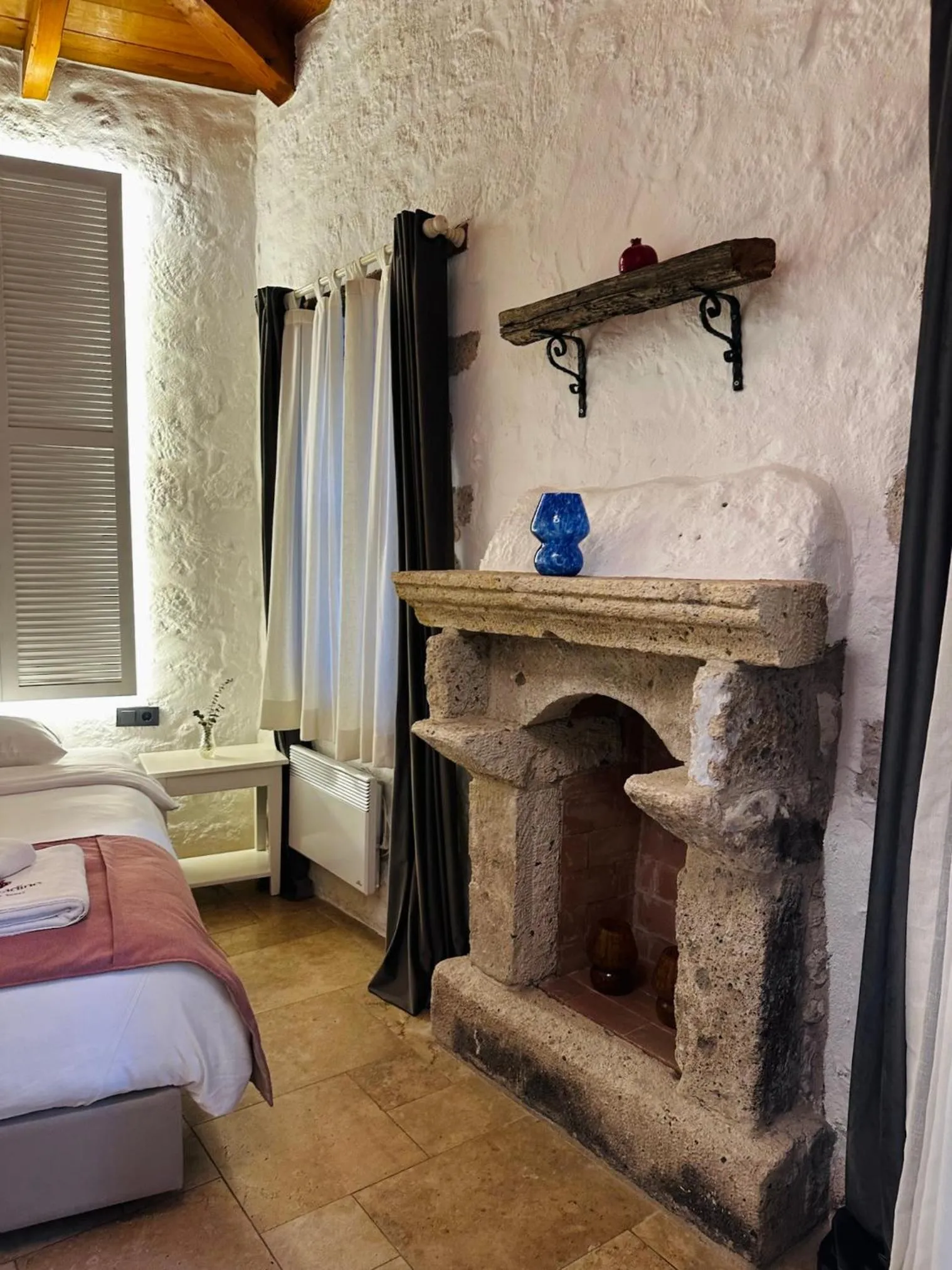 Bed in La Grenadine Hotel