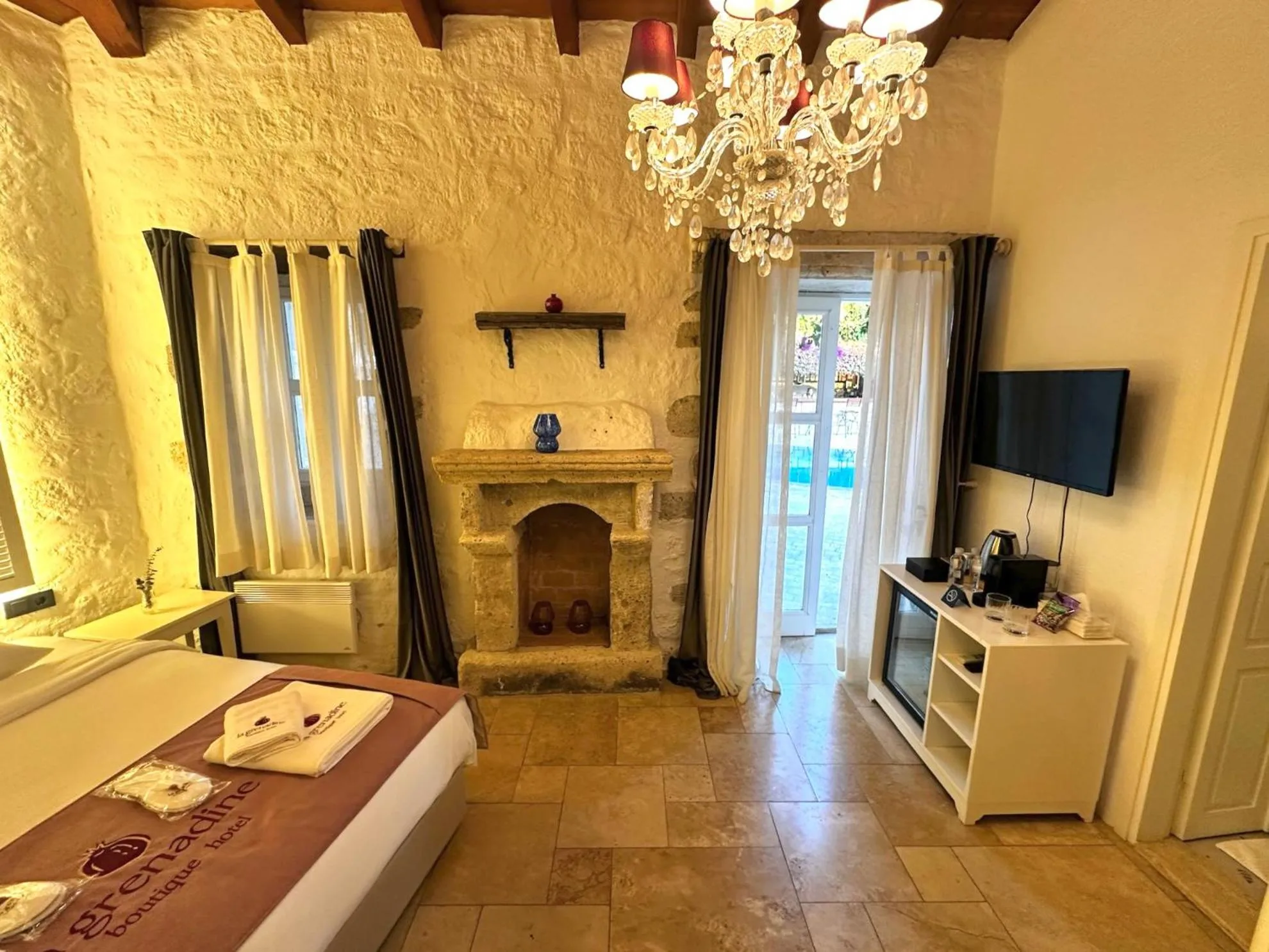 Bed in La Grenadine Hotel
