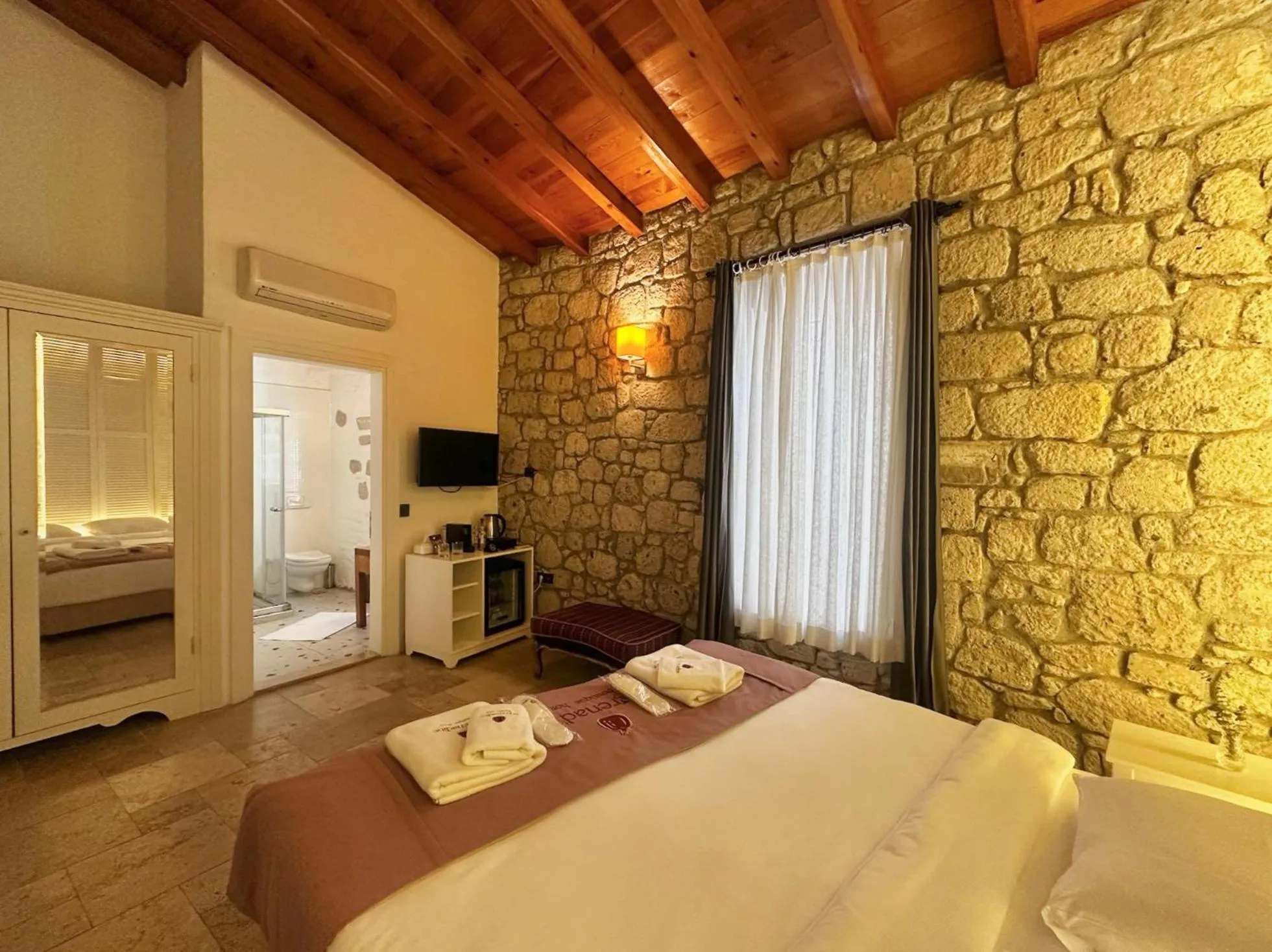 Bed in La Grenadine Hotel